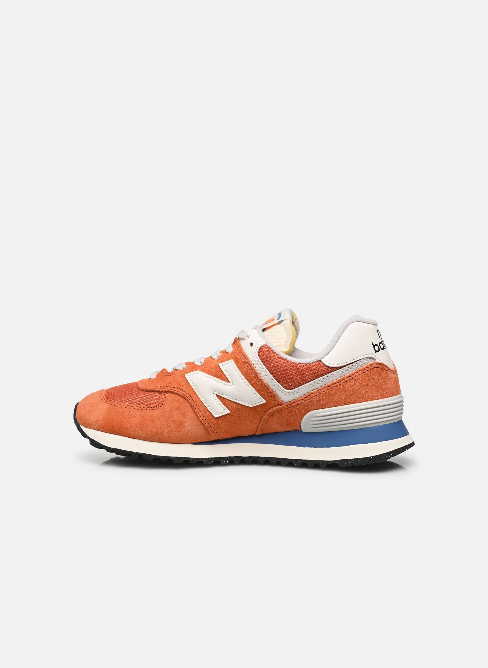 Baskets basses U574 femme orange New Balance Baskets basses U574 femme orange INFIELD CLAY