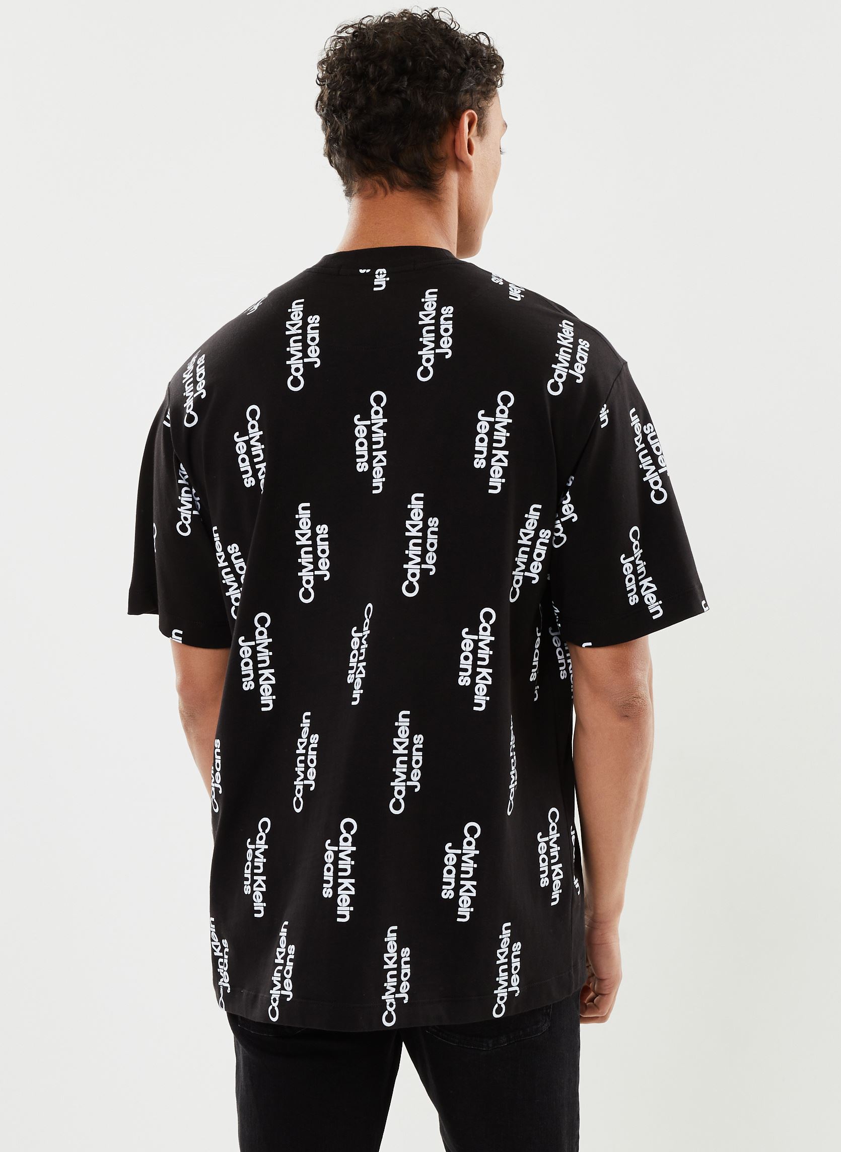 Tee-shirts manches courtes Stacked Logo Aop Tee homme noir Calvin Klein Jeans Tee-shirts manches courtes Stacked Logo Aop Tee homme noir BLACK