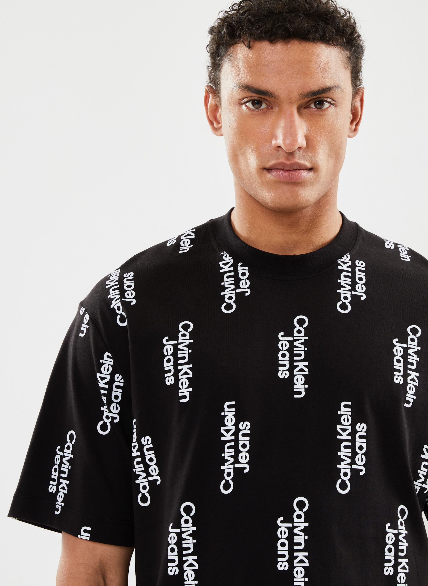 Tee-shirts manches courtes Stacked Logo Aop Tee homme noir Calvin Klein Jeans Tee-shirts manches courtes Stacked Logo Aop Tee homme noir BLACK