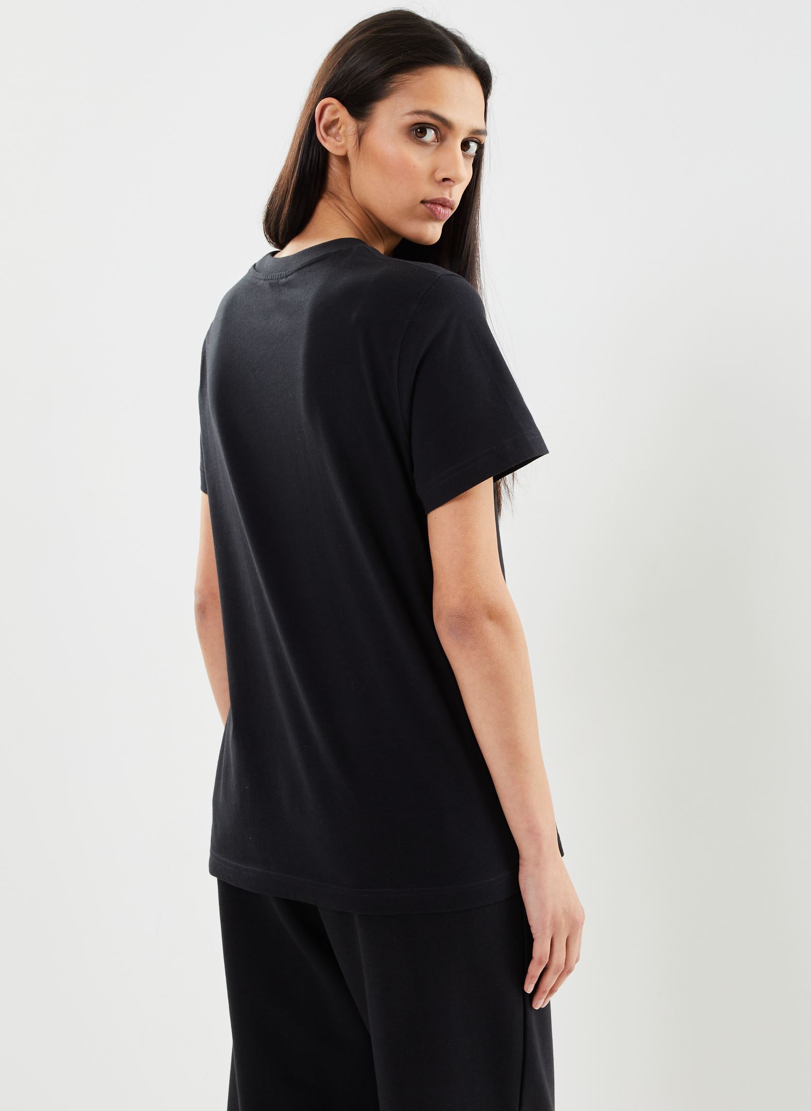 Tee-shirts manches courtes Sport Essentials jersey T-Shirt femme noir New Balance Tee-shirts manches courtes Sport Essentials jersey T-Shirt femme noir Black