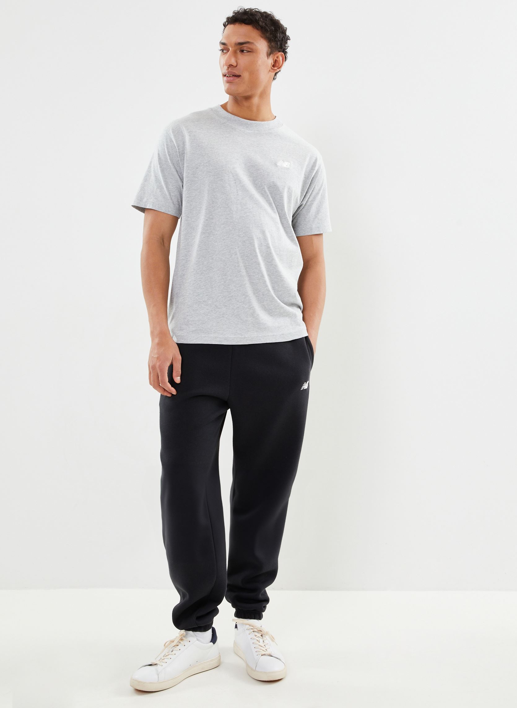 Bas de jogging Sport Essentials Fleece Jogger homme noir New Balance Bas de jogging Sport Essentials Fleece Jogger homme noir BLACK