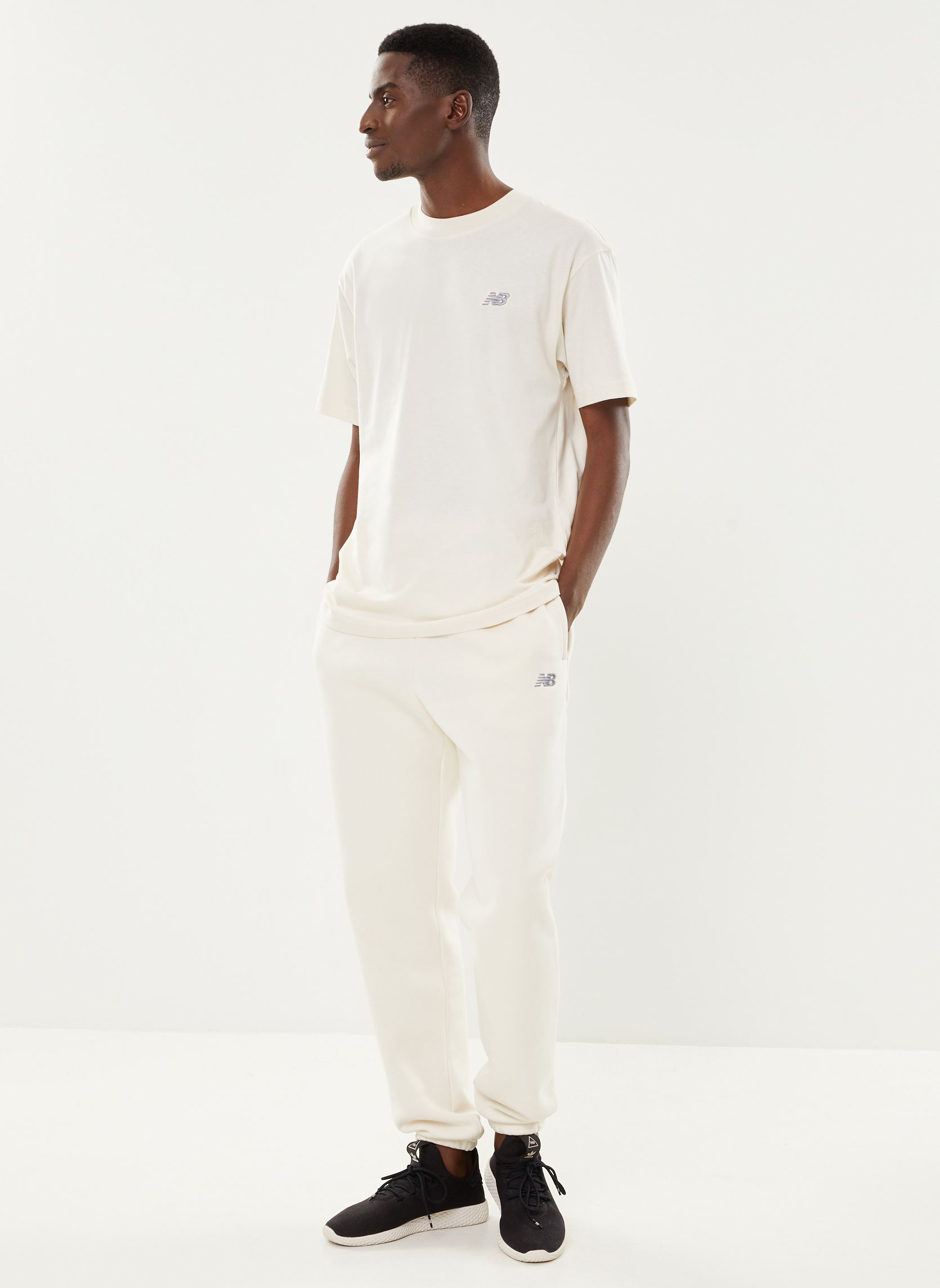 Bas de jogging Sport Essentials Fleece Jogger homme blanc New Balance Bas de jogging Sport Essentials Fleece Jogger homme blanc Linen