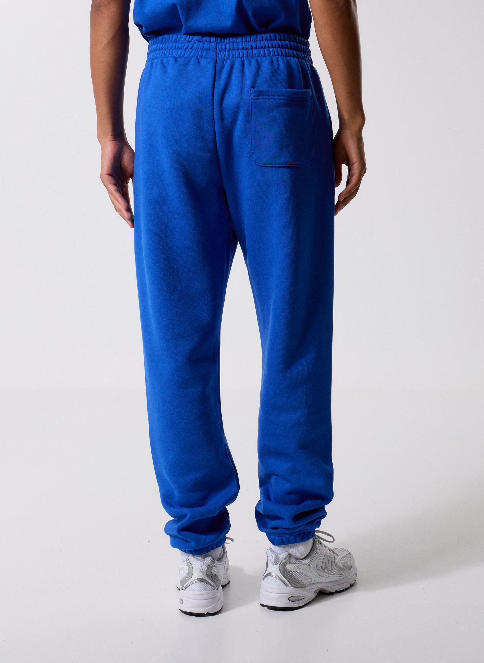 Bas de jogging Sport Essentials Fleece Jogger homme bleu New Balance Bas de jogging Sport Essentials Fleece Jogger homme bleu Blue Gemstone