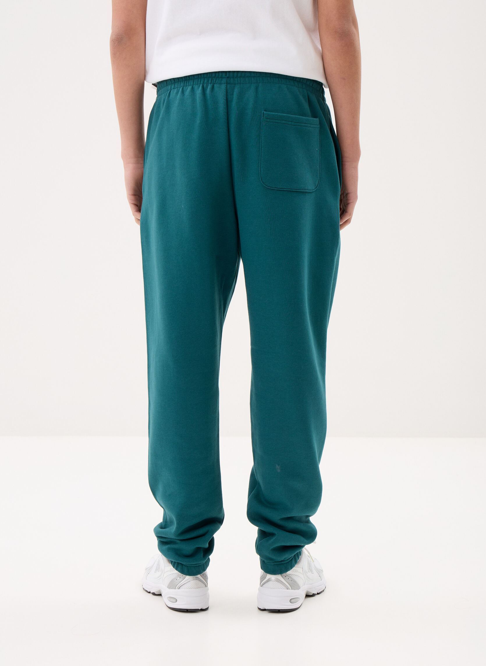 Trainingsbroeken Sport Essentials Fleece Jogger heren groen New Balance Trainingsbroeken Sport Essentials Fleece Jogger heren groen Medusa Green