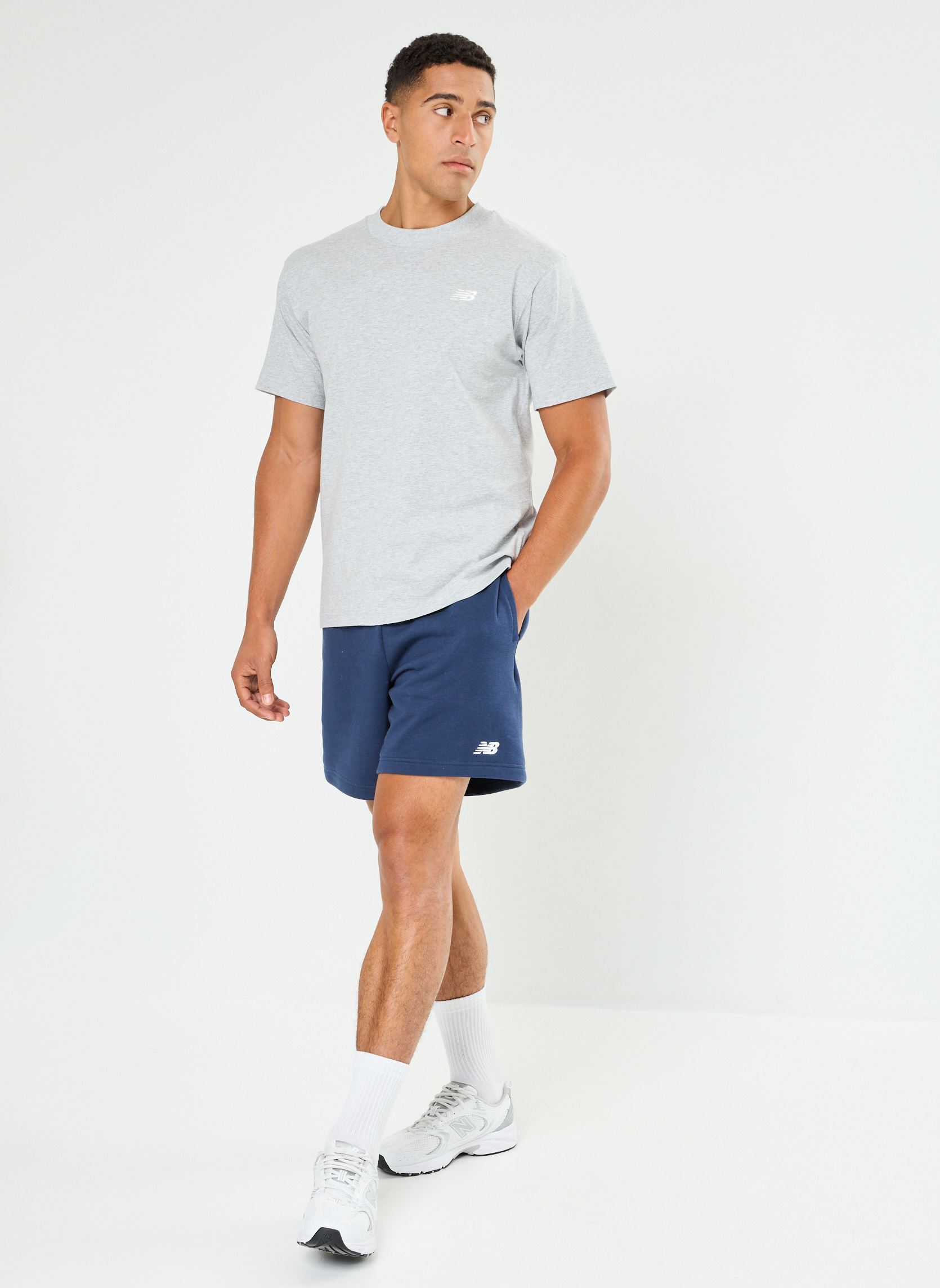 Shorts de sport Sport Essentials French Terry Short 7 homme bleu New Balance Shorts de sport Sport Essentials French Terry Short 7 homme bleu NB NAVY