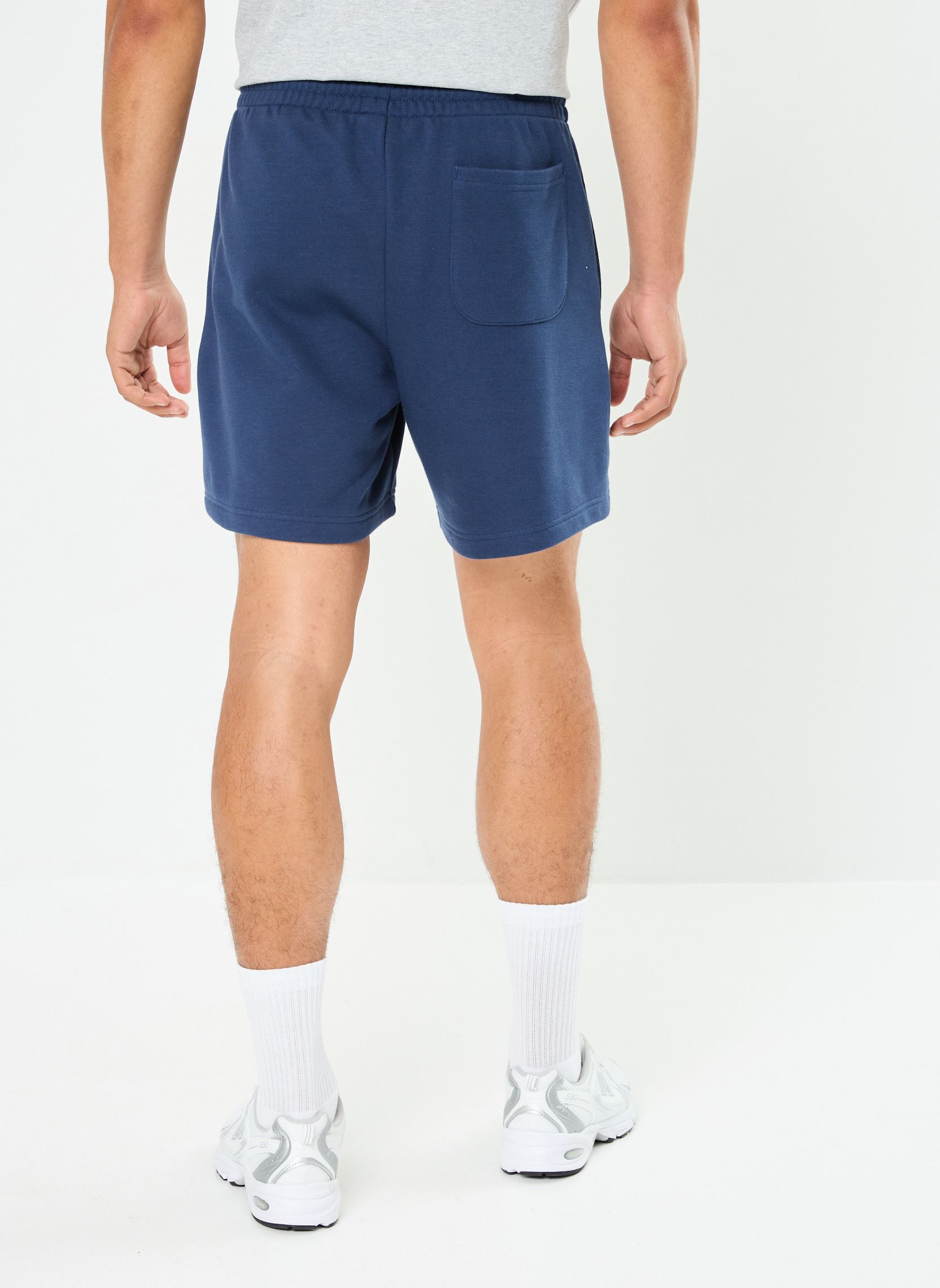 Shorts de sport Sport Essentials French Terry Short 7 homme bleu New Balance Shorts de sport Sport Essentials French Terry Short 7 homme bleu NB NAVY