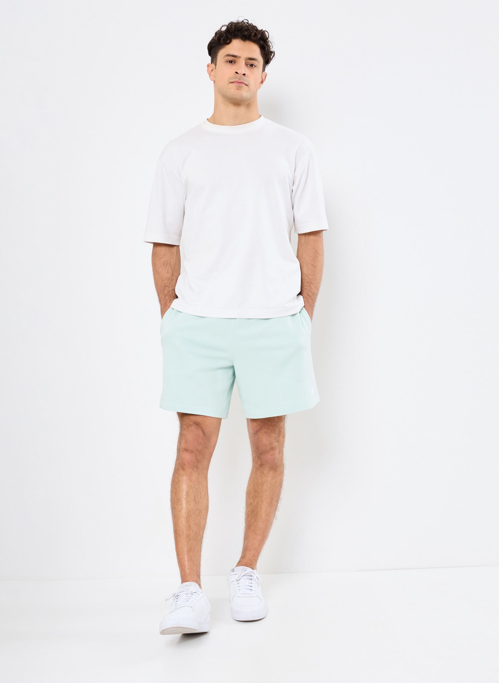 Shorts de sport Sport Essentials French Terry Short 7 homme vert New Balance Shorts de sport Sport Essentials French Terry Short 7 homme vert CLAY ASH