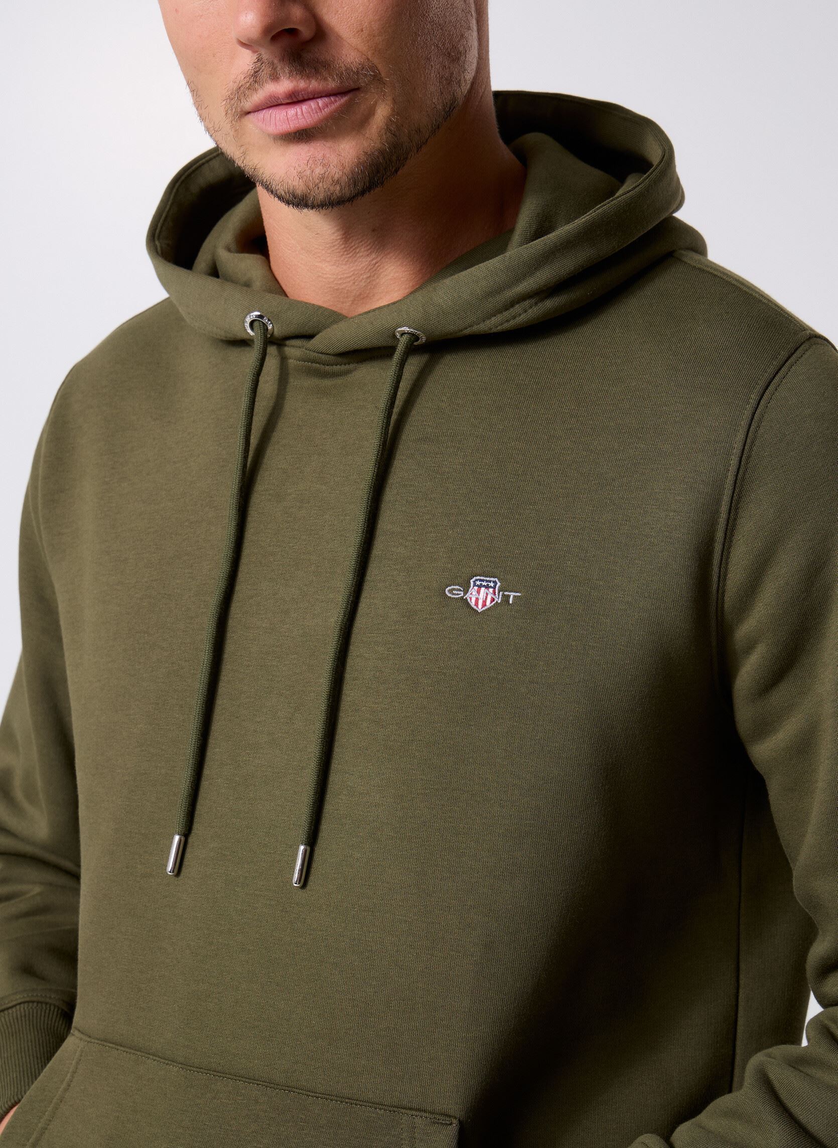 Jersey con capucha Reg Shield Hoodie hombre verde GANT Jersey con capucha Reg Shield Hoodie hombre verde MOSS GREEN