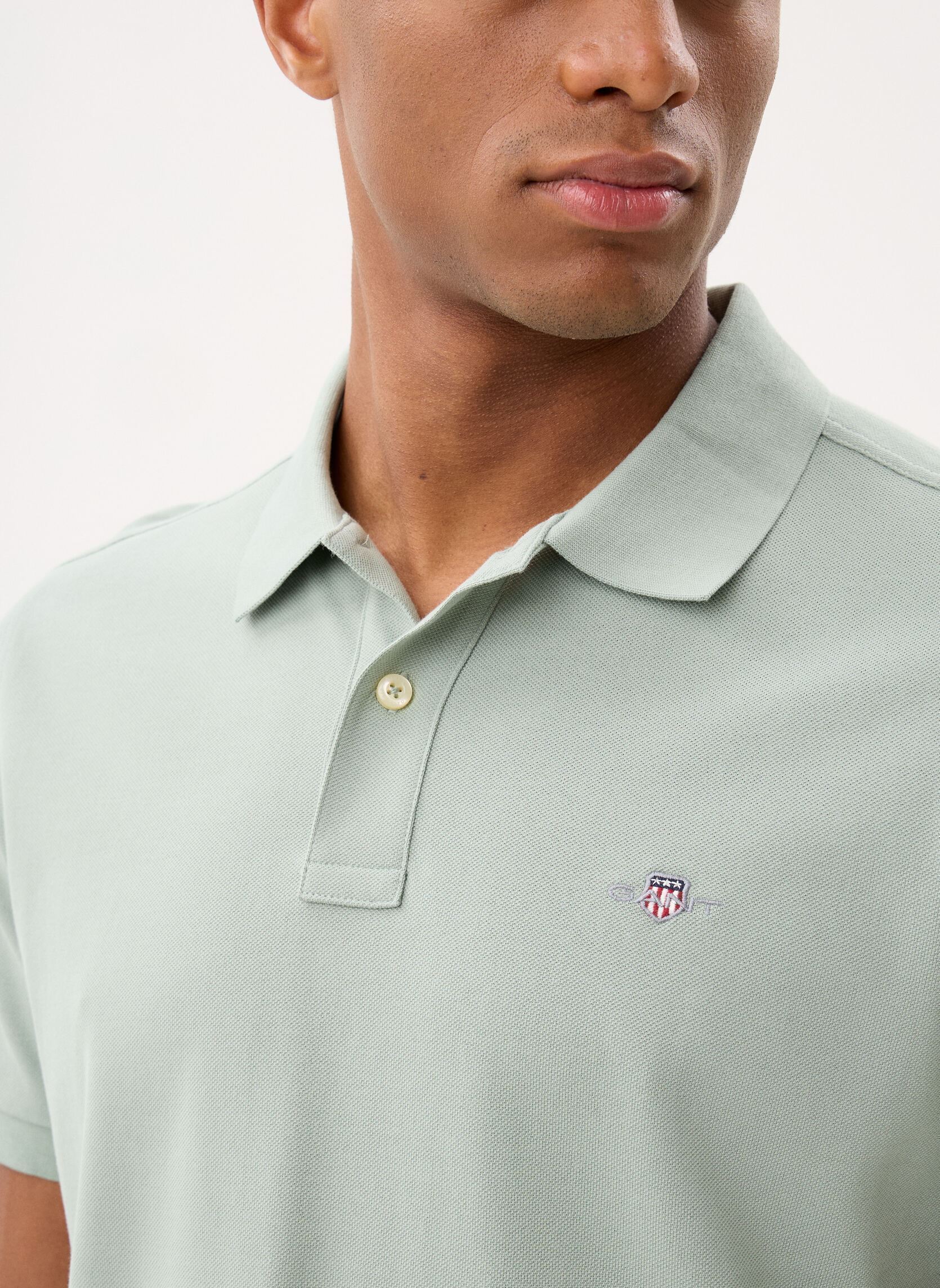 Polos manches courtes Reg Shield Ss Pique Polo homme gris GANT Polos manches courtes Reg Shield Ss Pique Polo homme gris CERAMIC GREY
