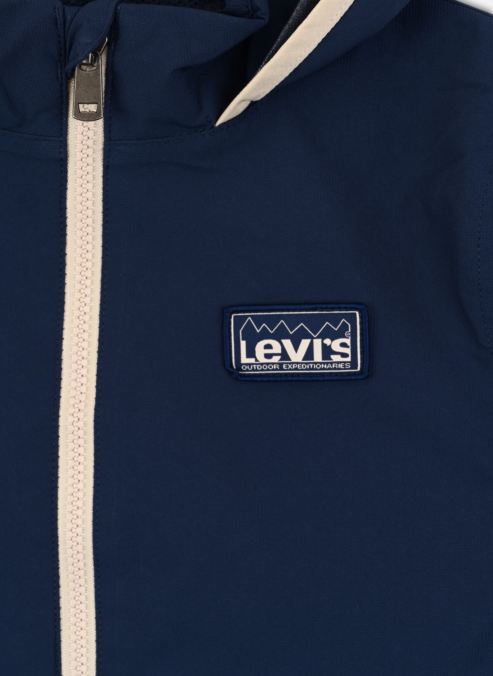 Vestes imperméables et coupe-vents Levi's Stowaway Hooded Essential Windbre garçon bleu Levi's Kids Vestes imperméables et coupe-vents Levi's Stowaway Hooded Essential Windbre garçon bleu Naval Academy