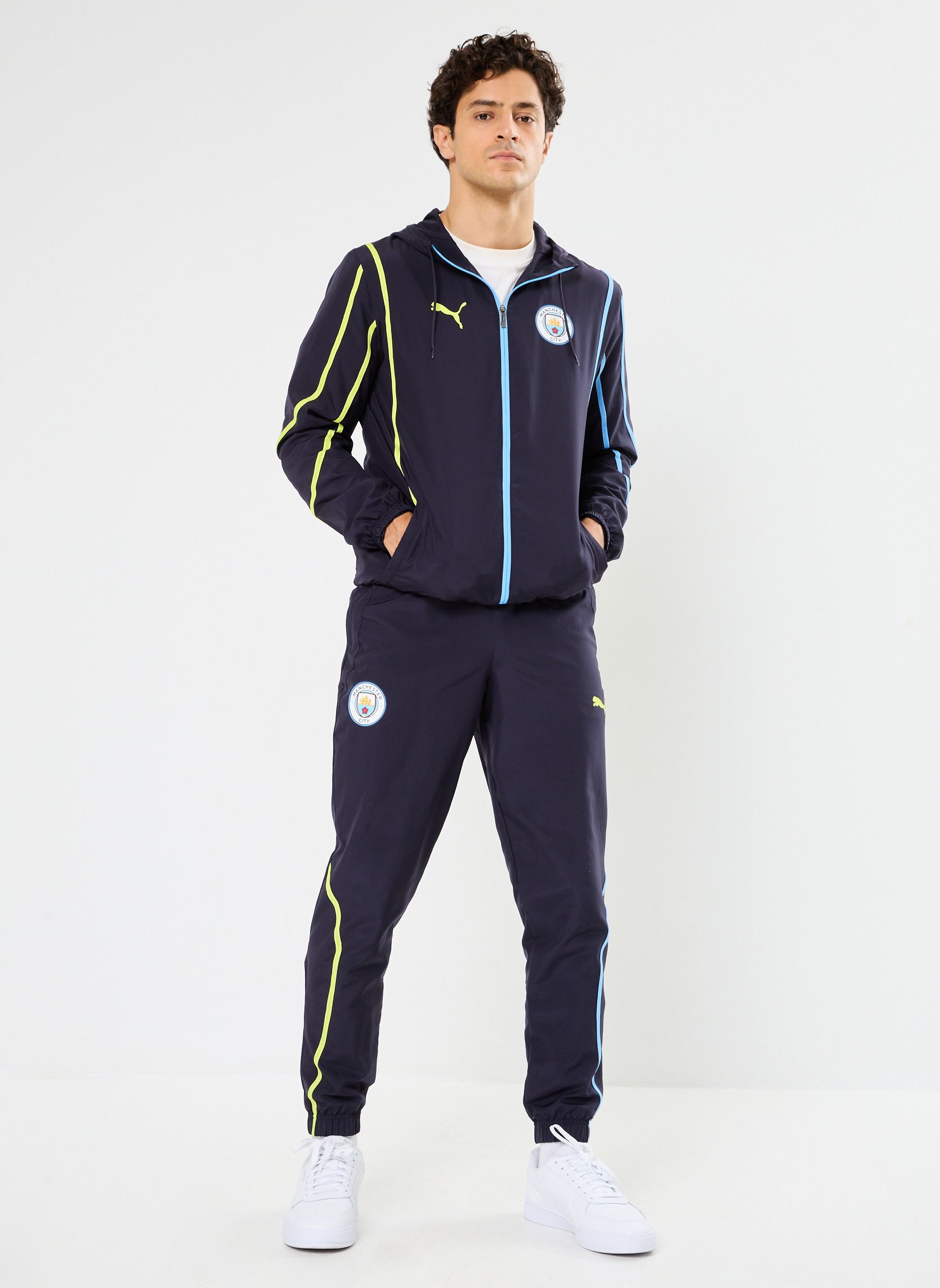 Vestes de survêtement Veste de foot woven Manchester City homme noir Puma Vestes de survêtement Veste de foot woven Manchester City homme noir New Navy-Yellow Glow