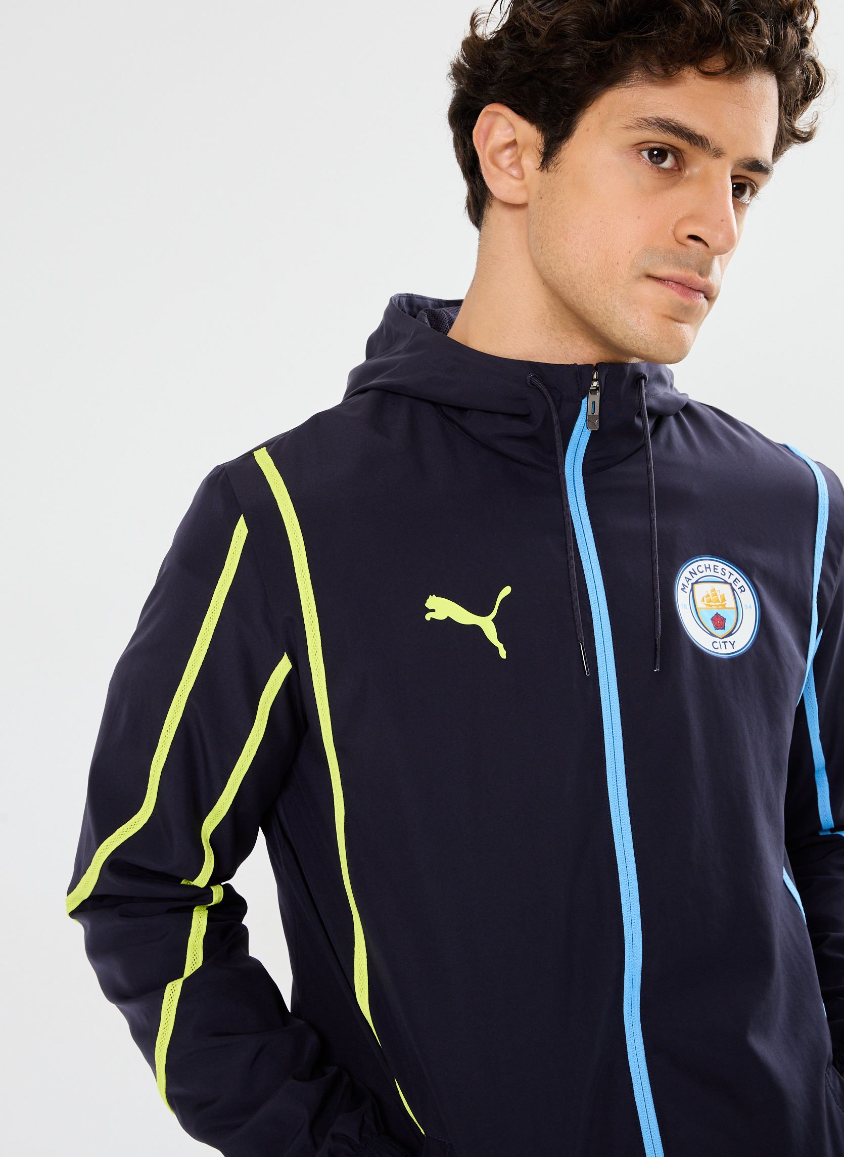 Vestes de survêtement Veste de foot woven Manchester City homme noir Puma Vestes de survêtement Veste de foot woven Manchester City homme noir New Navy-Yellow Glow