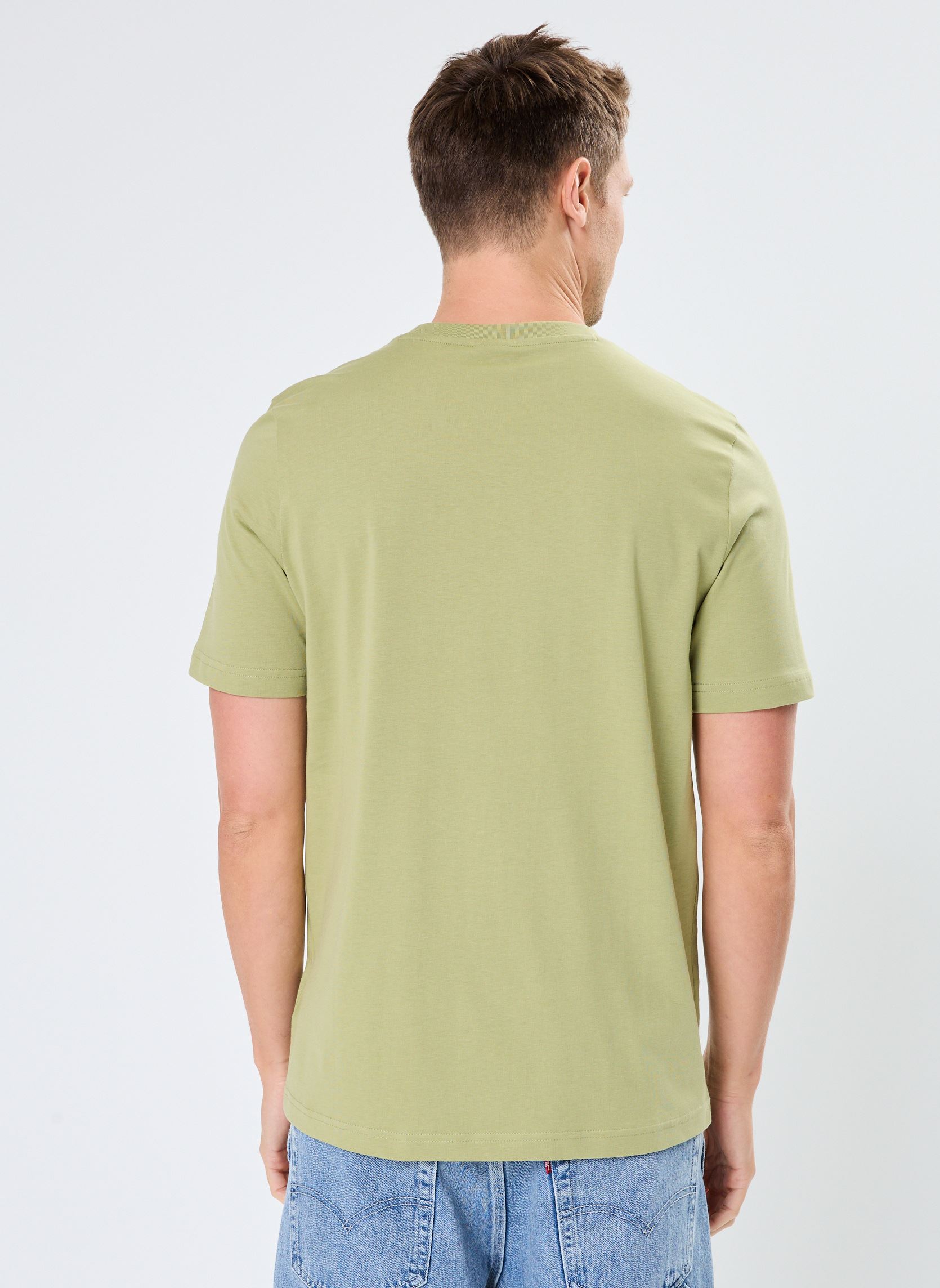 T-shirts met korte mouwen M CLA SLOGO TEE heren groen Puma T-shirts met korte mouwen M CLA SLOGO TEE heren groen Calming Green