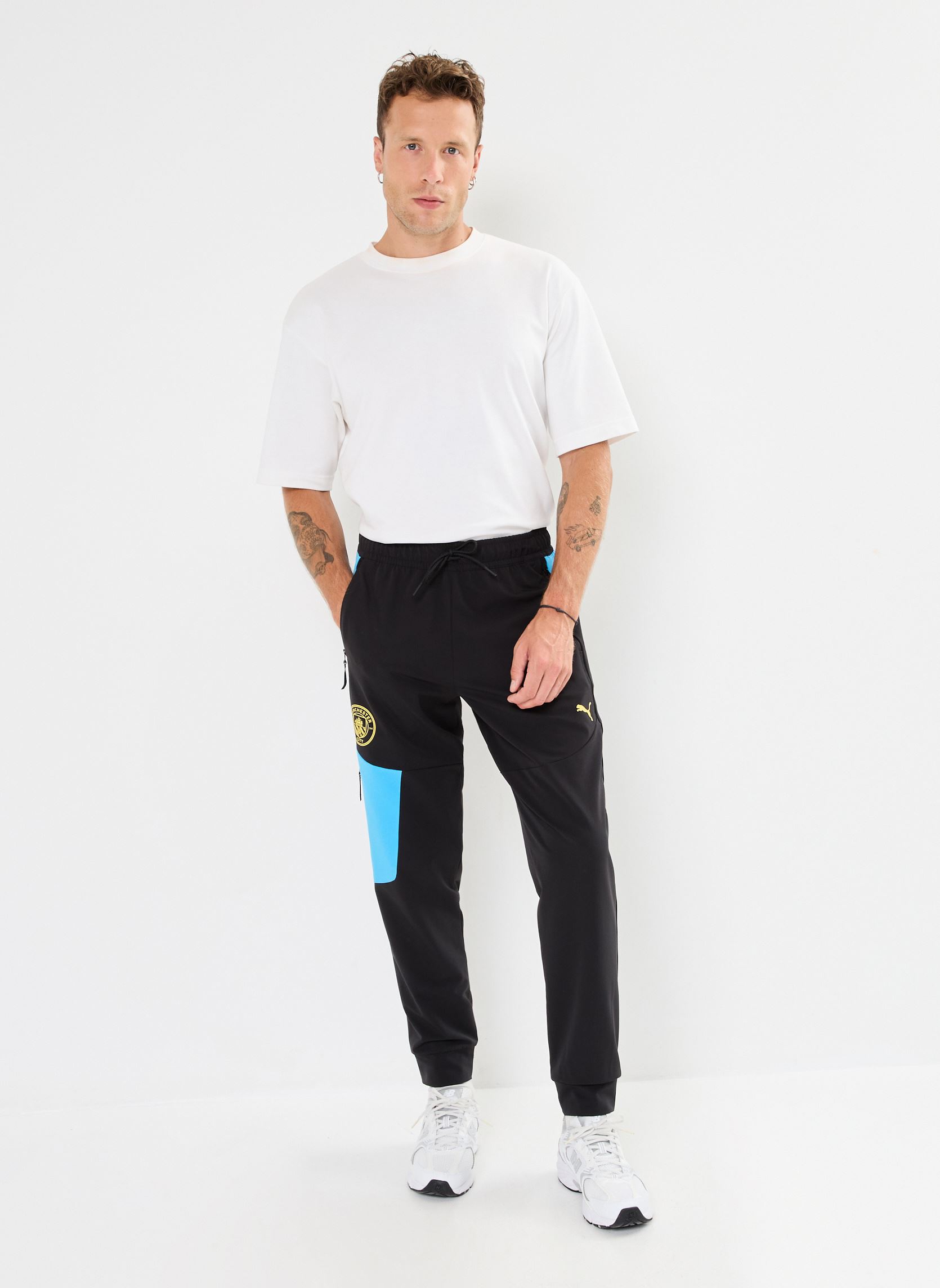 Jogginghosen Pantalon de foot Manchester City herren schwarz Puma Jogginghosen Pantalon de foot Manchester City herren schwarz PUMA Black-Magic Blue