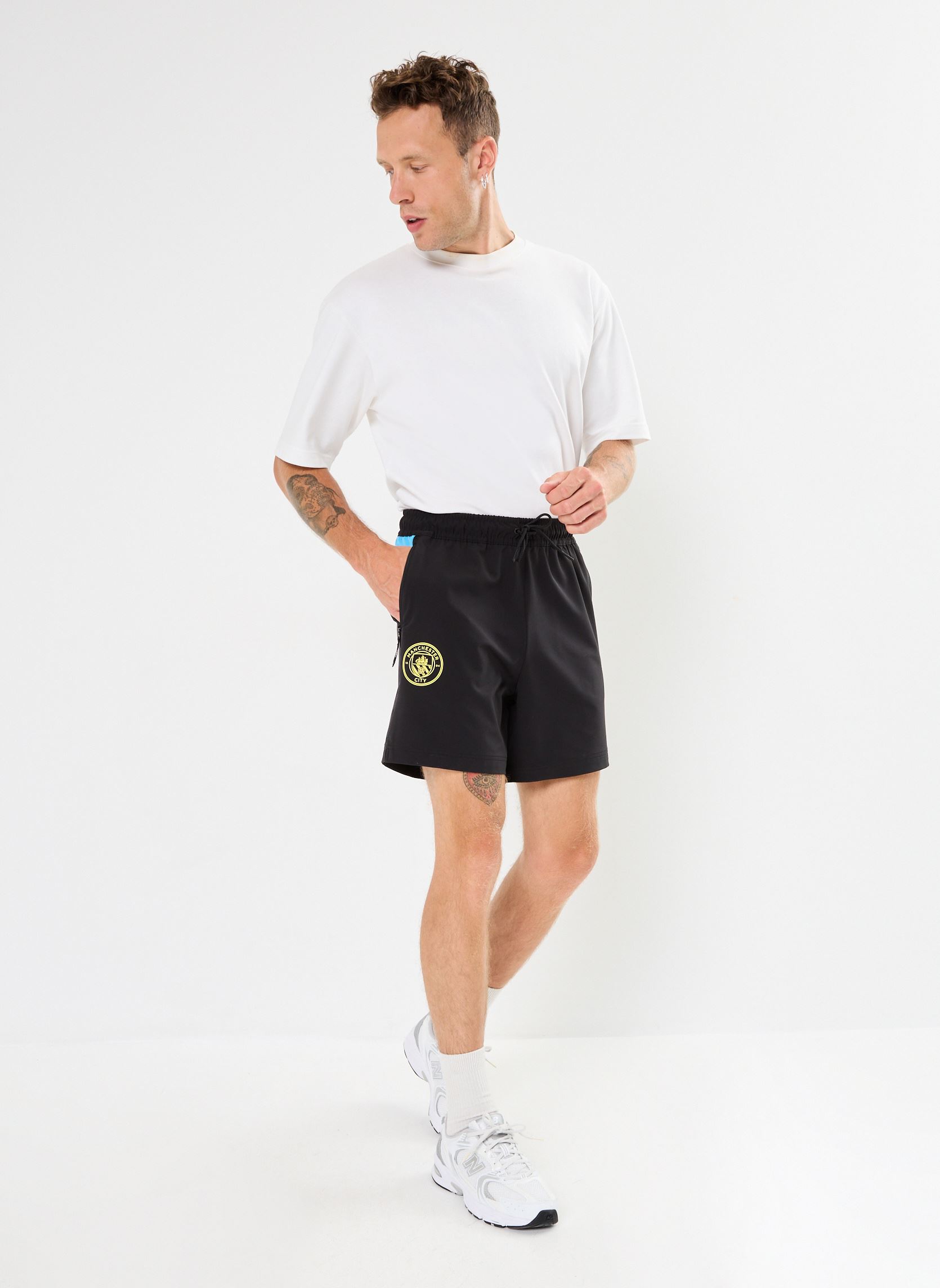 Shorts de sport Short de foot Manchester City homme noir Puma Shorts de sport Short de foot Manchester City homme noir PUMA Black-Magic Blue