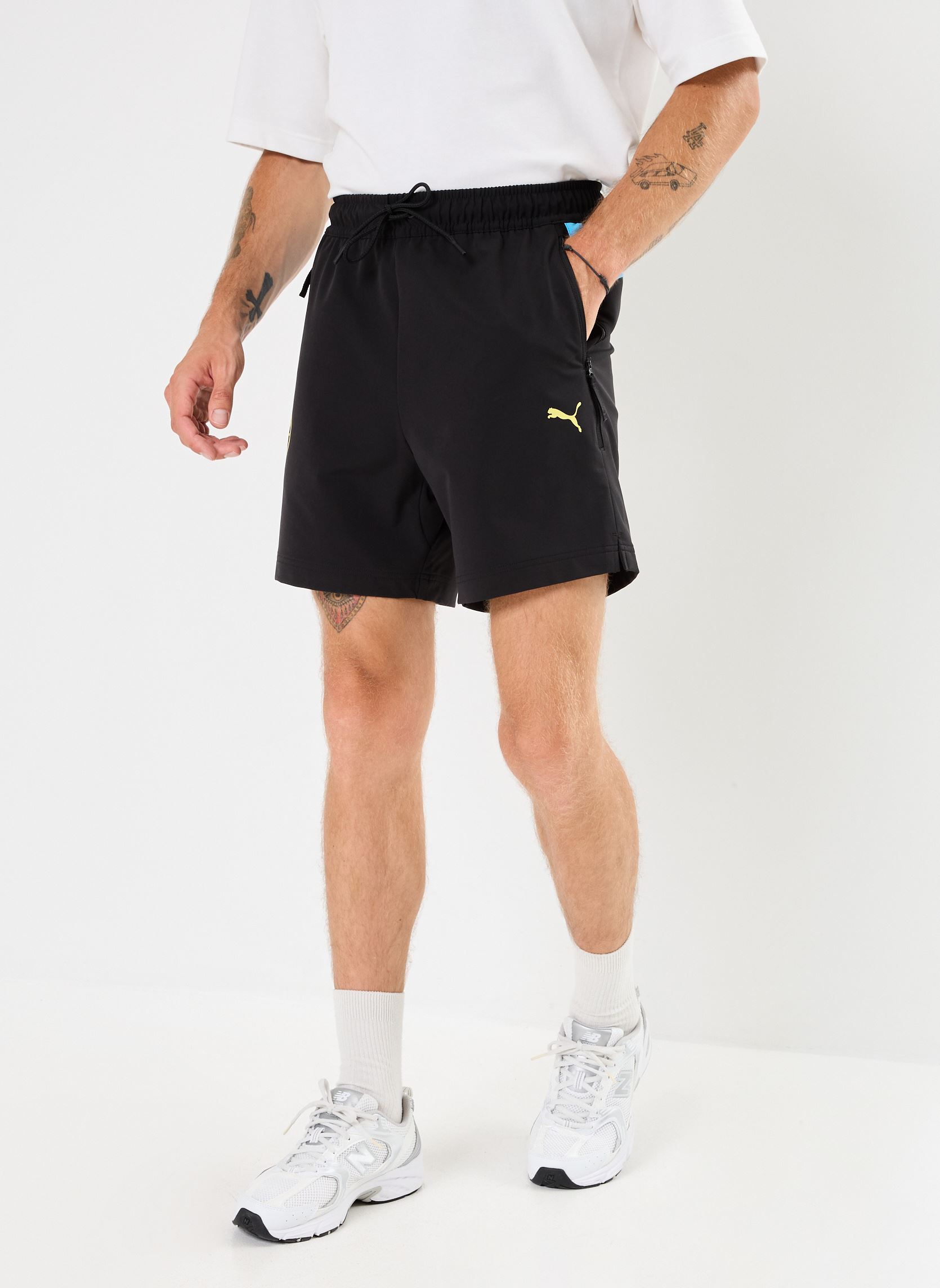 Shorts de sport Short de foot Manchester City homme noir Puma Shorts de sport Short de foot Manchester City homme noir PUMA Black-Magic Blue