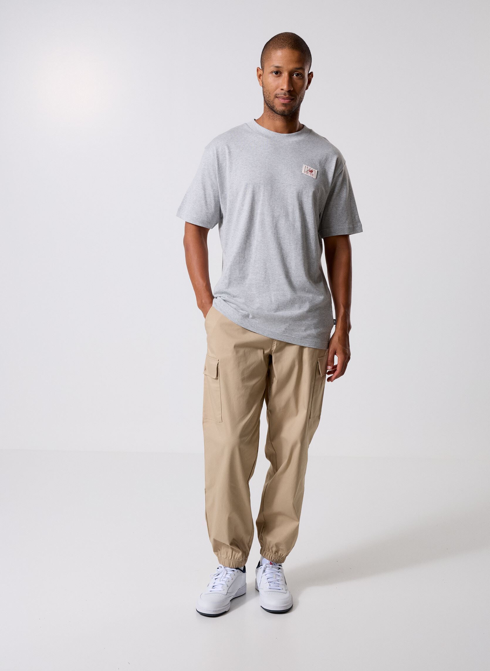 Pantalons chino Twill Cargo Jogger homme beige New Balance Pantalons chino Twill Cargo Jogger homme beige STONEWARE