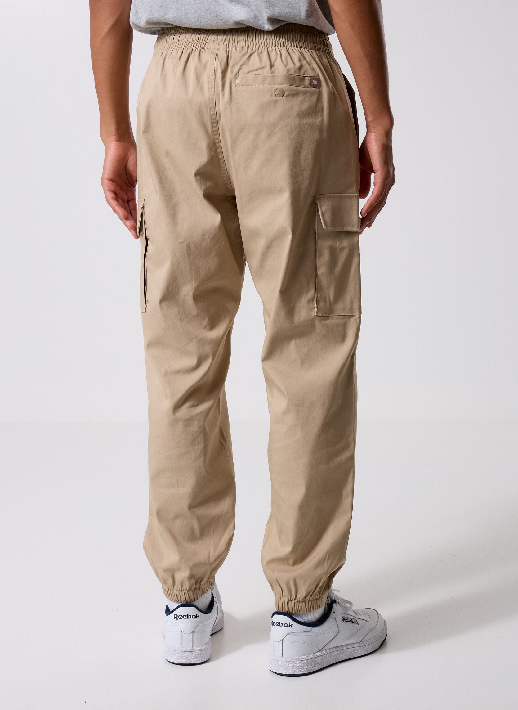 Pantalons chino Twill Cargo Jogger homme beige New Balance Pantalons chino Twill Cargo Jogger homme beige STONEWARE