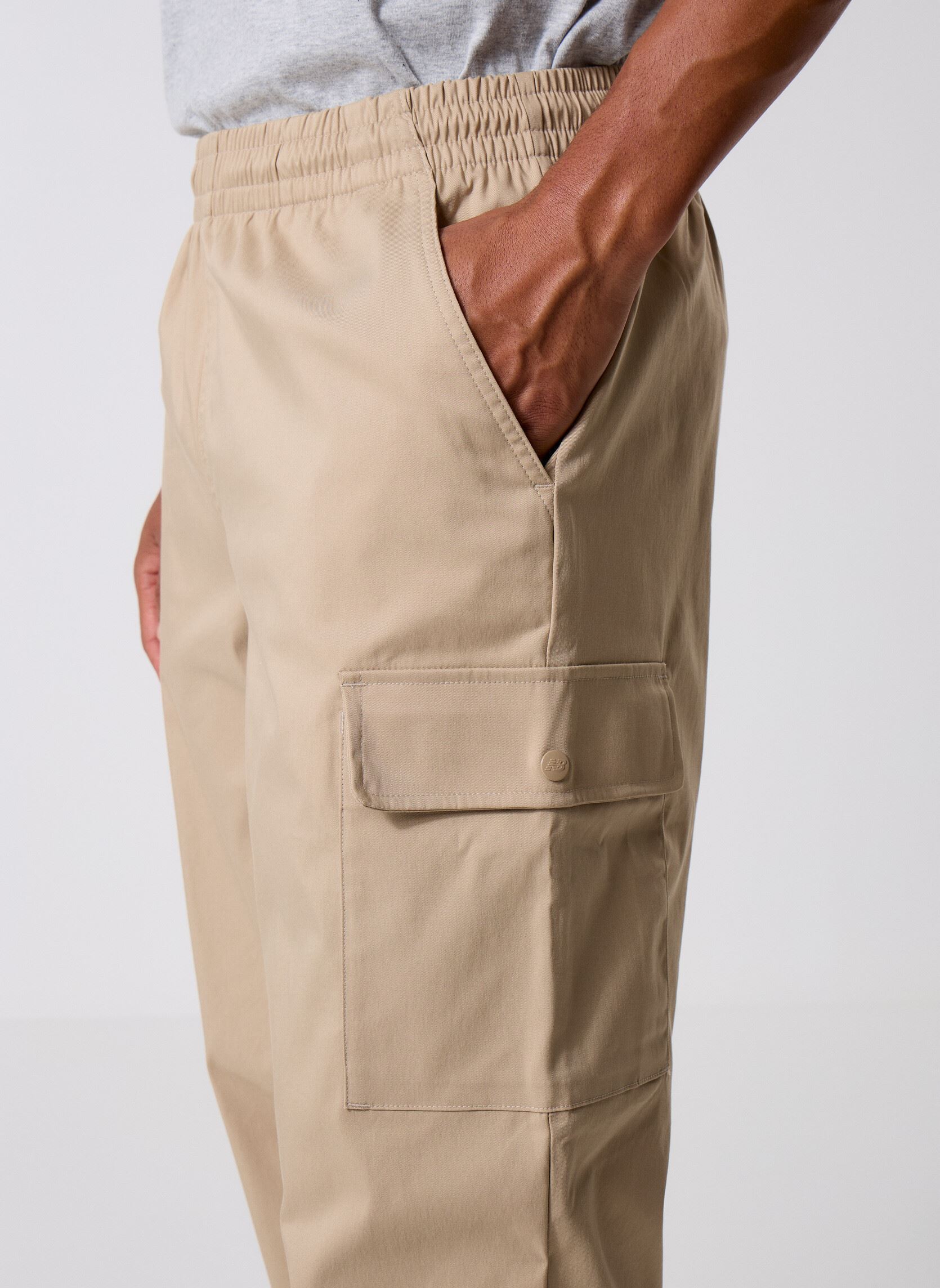 Pantalons chino Twill Cargo Jogger homme beige New Balance Pantalons chino Twill Cargo Jogger homme beige STONEWARE