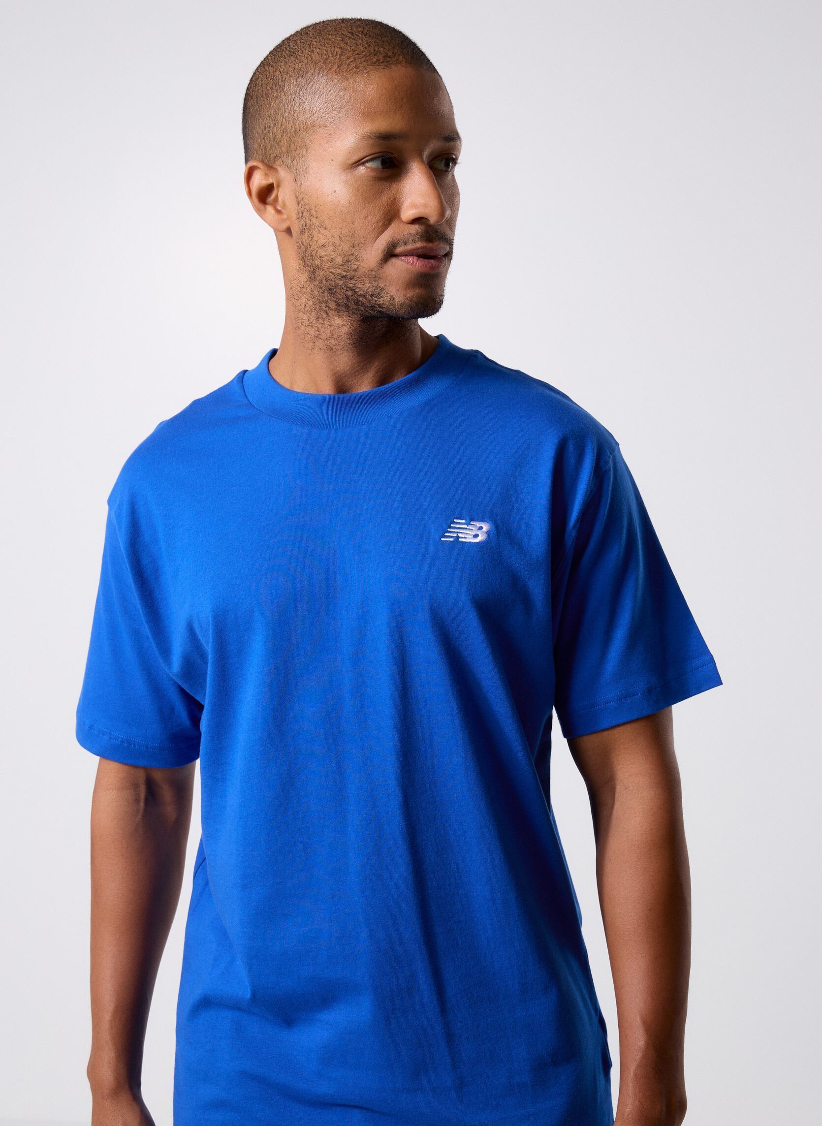 Tee-shirts manches courtes Sport Essentials Cotton T-Shirt homme bleu New Balance Tee-shirts manches courtes Sport Essentials Cotton T-Shirt homme bleu Blue Gemstone