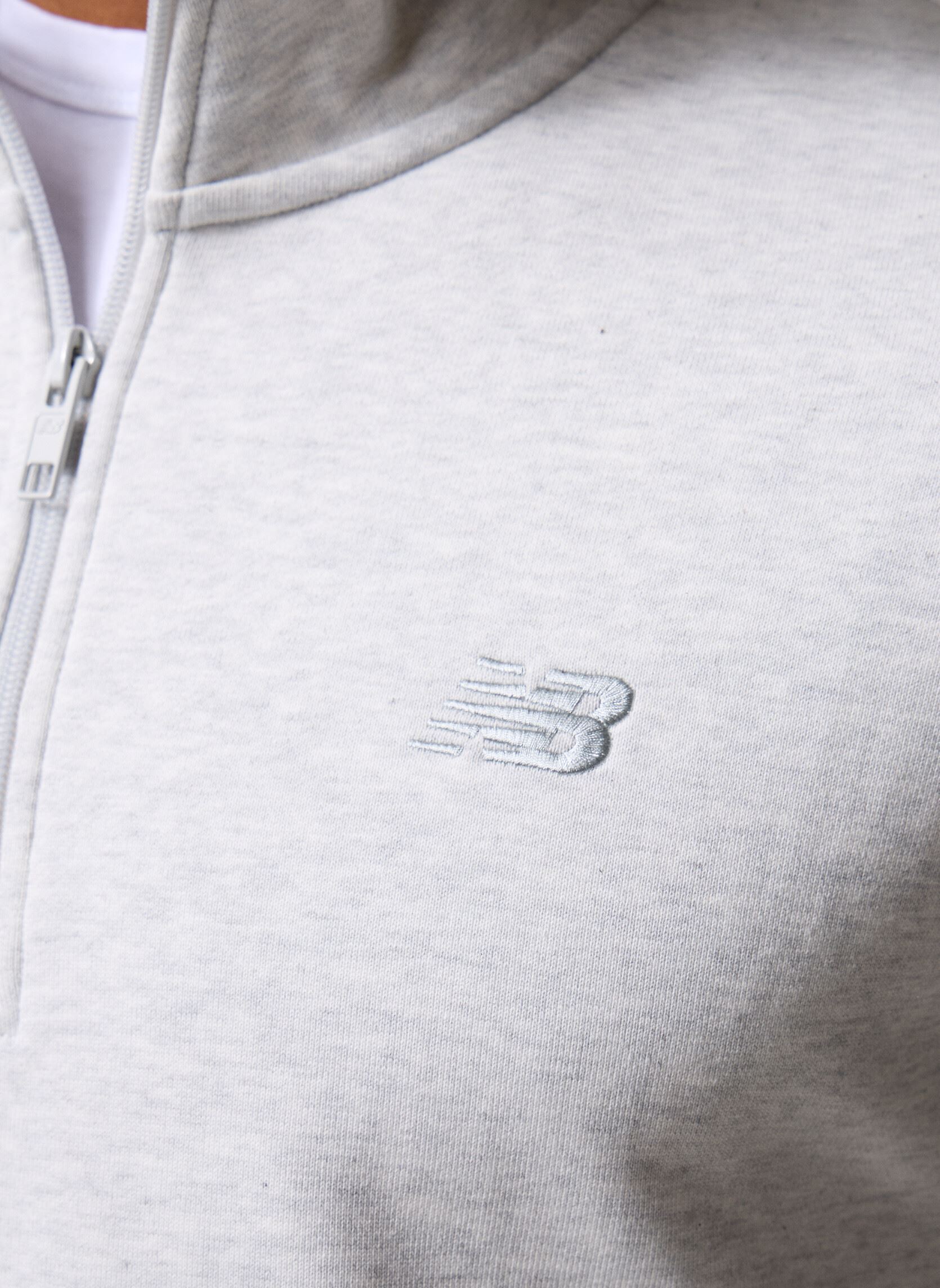 Sweaters met rits Athletics Fleece 1/2 Zip heren grijs New Balance Sweaters met rits Athletics Fleece 1/2 Zip heren grijs ASH HEATHER