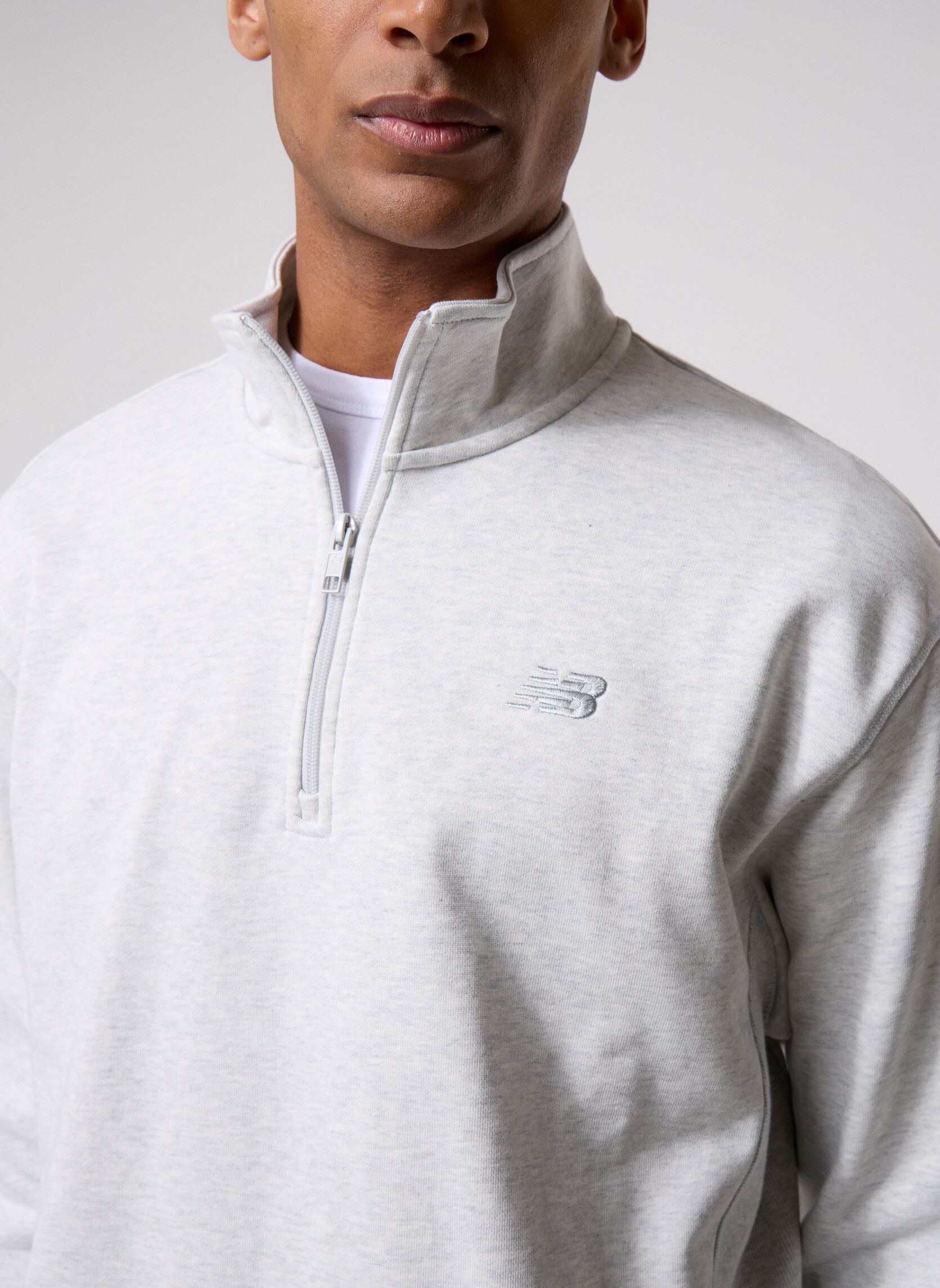 Sweaters met rits Athletics Fleece 1/2 Zip heren grijs New Balance Sweaters met rits Athletics Fleece 1/2 Zip heren grijs ASH HEATHER