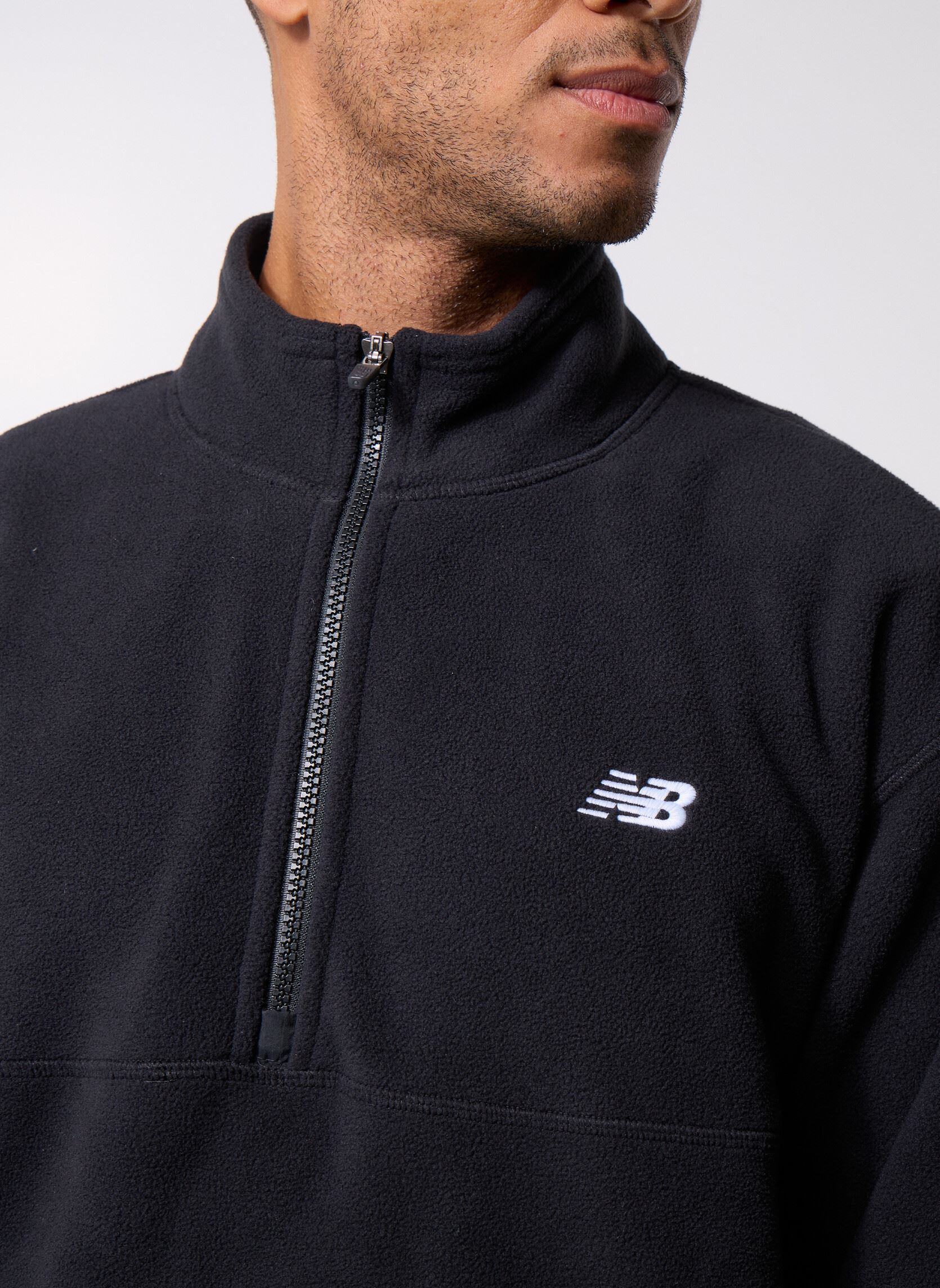 Sweats zippés Polar Fleece 1/2 Zip homme noir New Balance Sweats zippés Polar Fleece 1/2 Zip homme noir BLACK