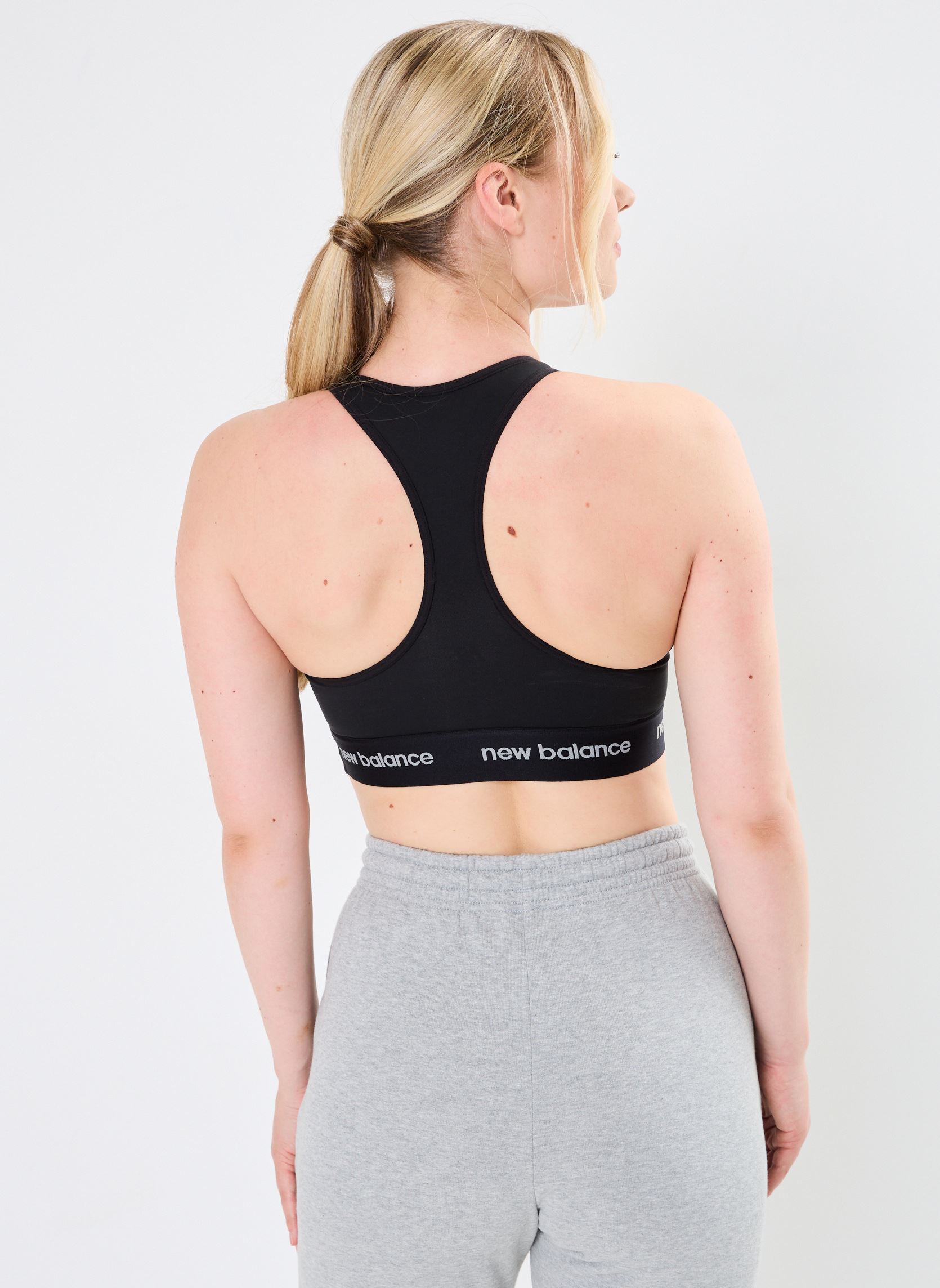 Reggiseni sport NB Sleek Medium Support Sports Bra donna nero New Balance Reggiseni sport NB Sleek Medium Support Sports Bra donna nero Black