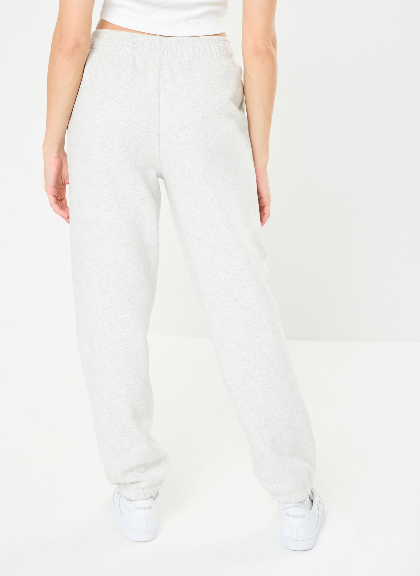 Bas de jogging Sport Essentials Fleece Jogger NPU femme gris New Balance Bas de jogging Sport Essentials Fleece Jogger NPU femme gris ASH HEATHER