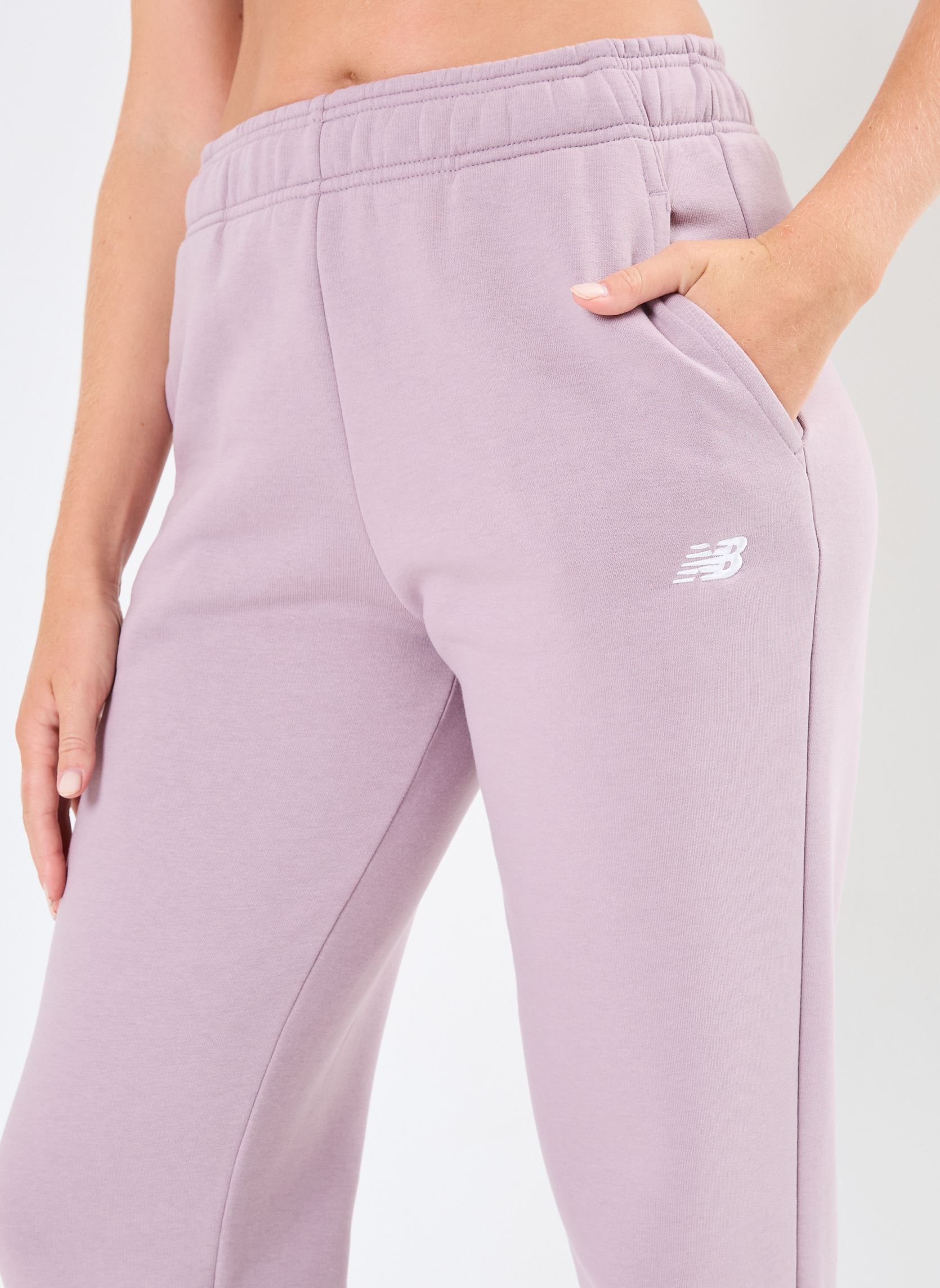 Bas de jogging Sport Essentials Fleece Jogger- femme violet New Balance Bas de jogging Sport Essentials Fleece Jogger- femme violet ICE WINE