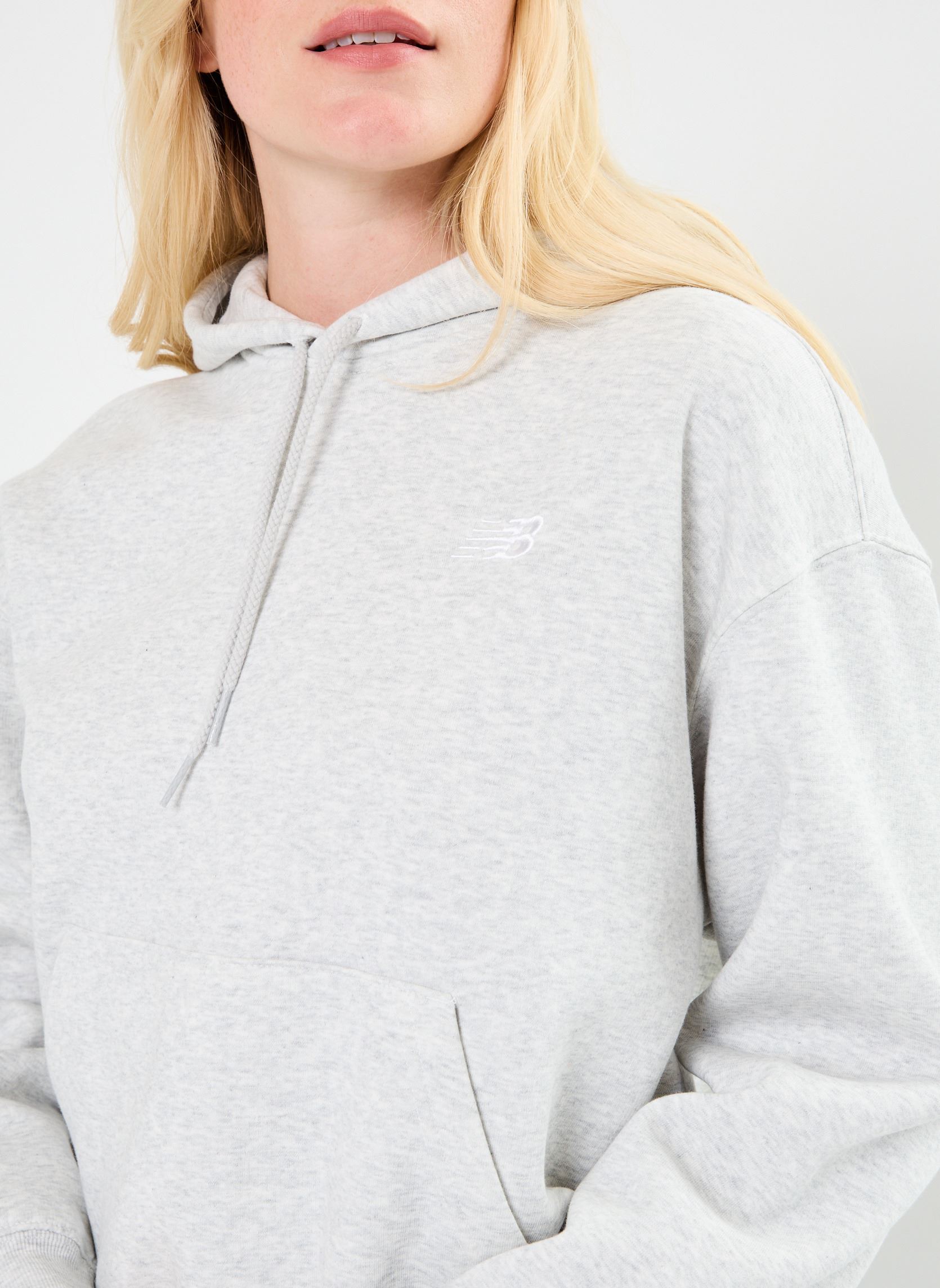 Sweats à capuche Sport Essentials Fleece Hoodie W femme gris New Balance Sweats à capuche Sport Essentials Fleece Hoodie W femme gris ASH HEATHER