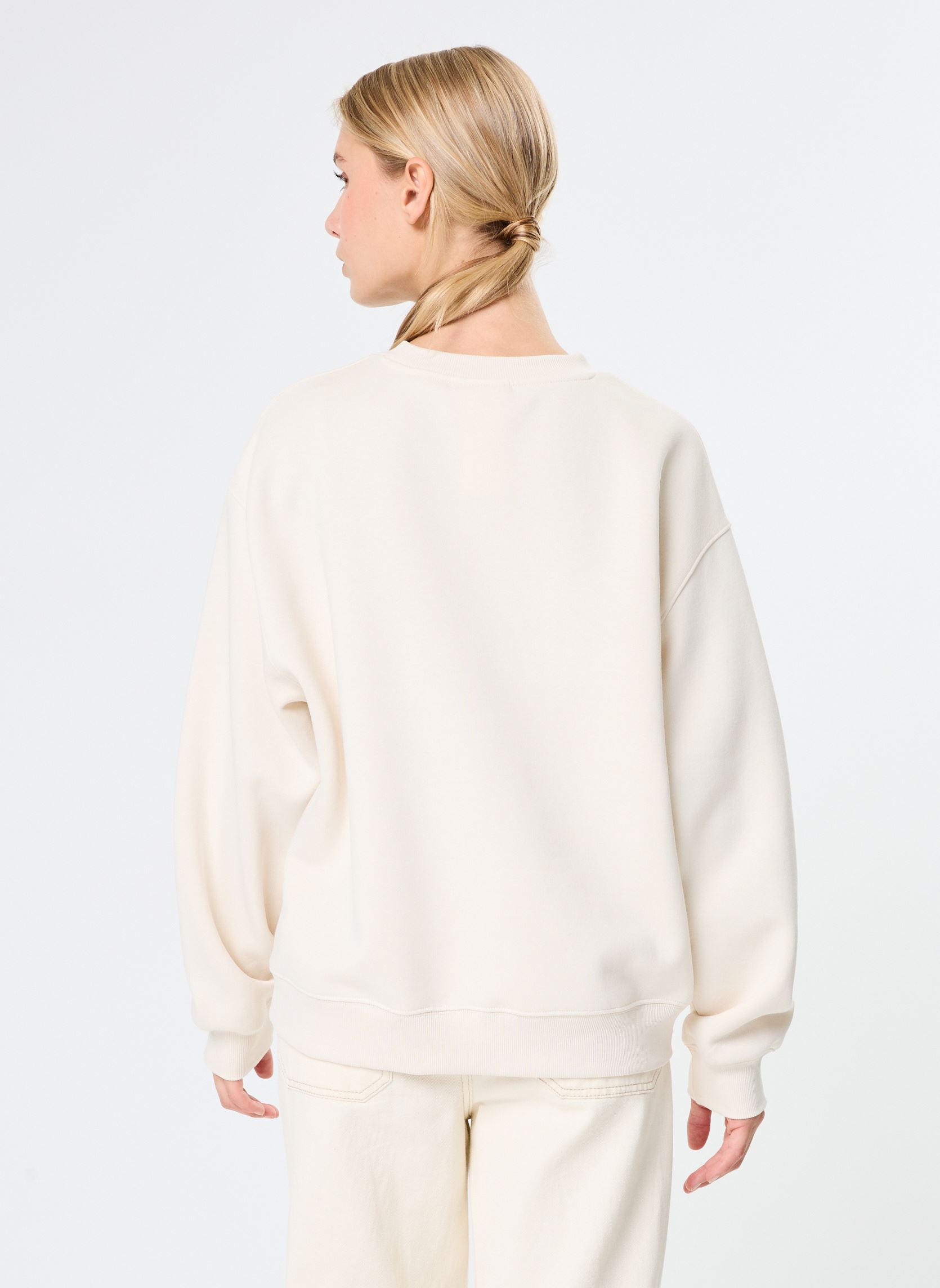 Sweater Graphic Fleece Crew dames beige New Balance Sweater Graphic Fleece Crew dames beige Linen
