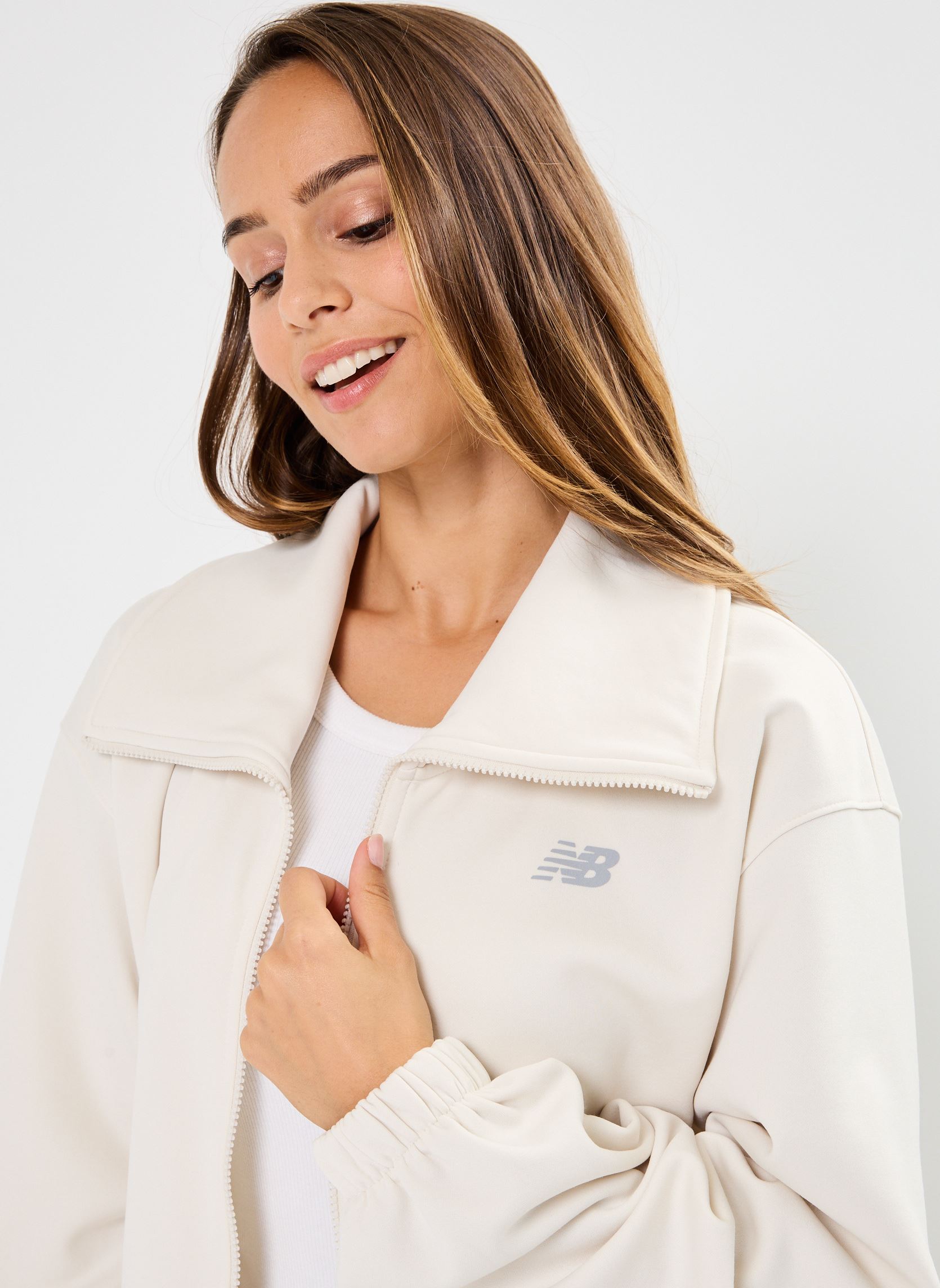 Vestes de survêtement Performance Fleece Full Zip femme beige New Balance Vestes de survêtement Performance Fleece Full Zip femme beige LINEN
