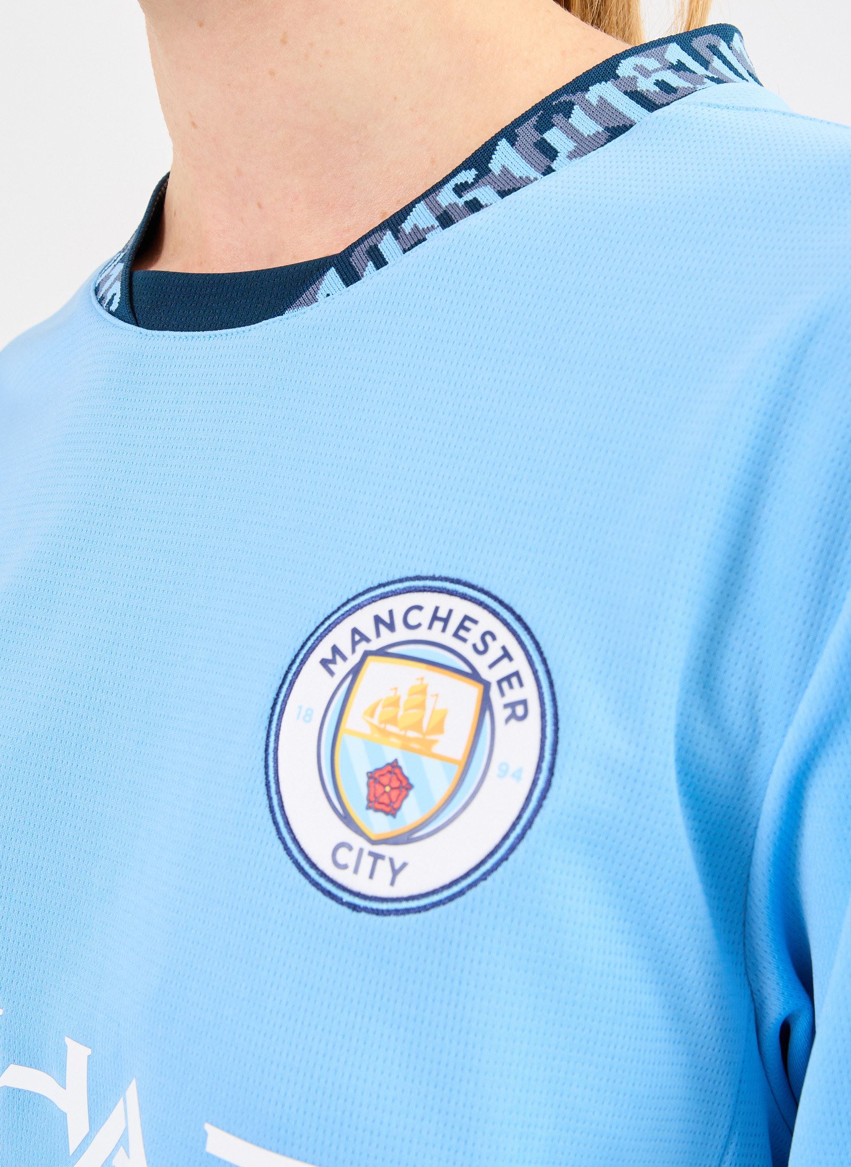 Tee-shirts manches courtes Maillot de foot Manchester City replica femme noir Puma Tee-shirts manches courtes Maillot de foot Manchester City replica femme noir TEAM LIGHT BLUE-MARINE BLUE