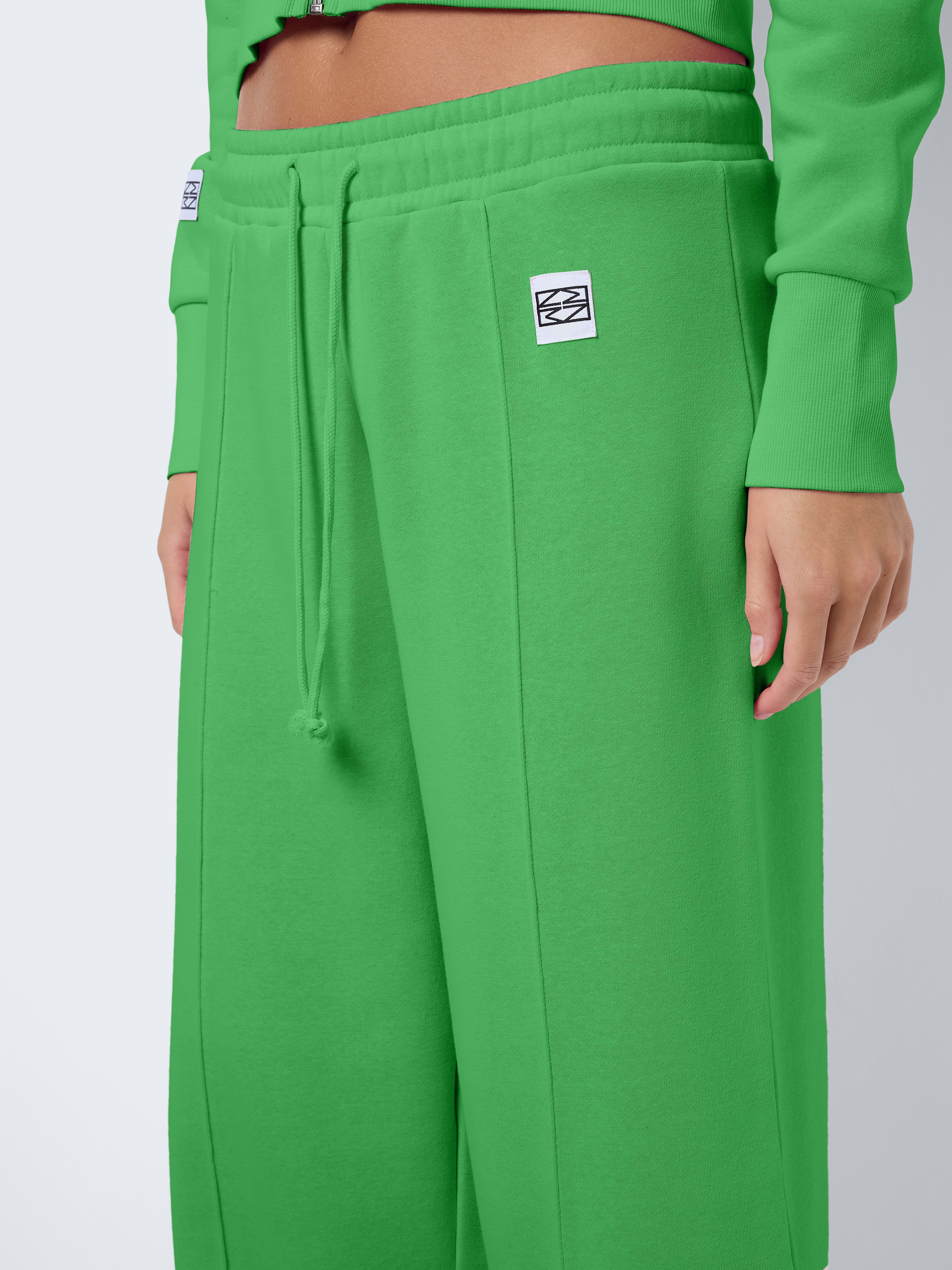 Trainingsbroeken NMARYA NW WIDE SWEAT PANTS JRS dames groen Noisy May Trainingsbroeken NMARYA NW WIDE SWEAT PANTS JRS dames groen Irish Green