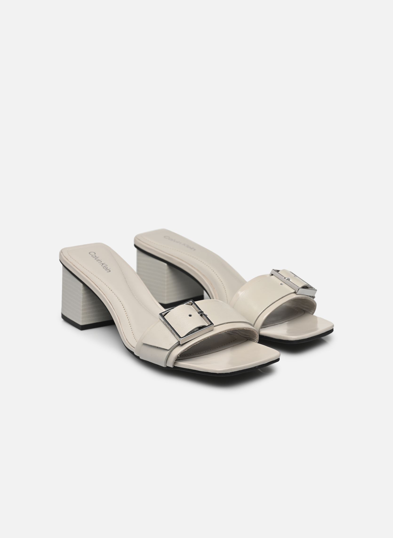 Sandales HEEL MULE 50 W/BUCKL femme gris Calvin Klein Sandales HEEL MULE 50 W/BUCKL femme gris MOON STRUCK