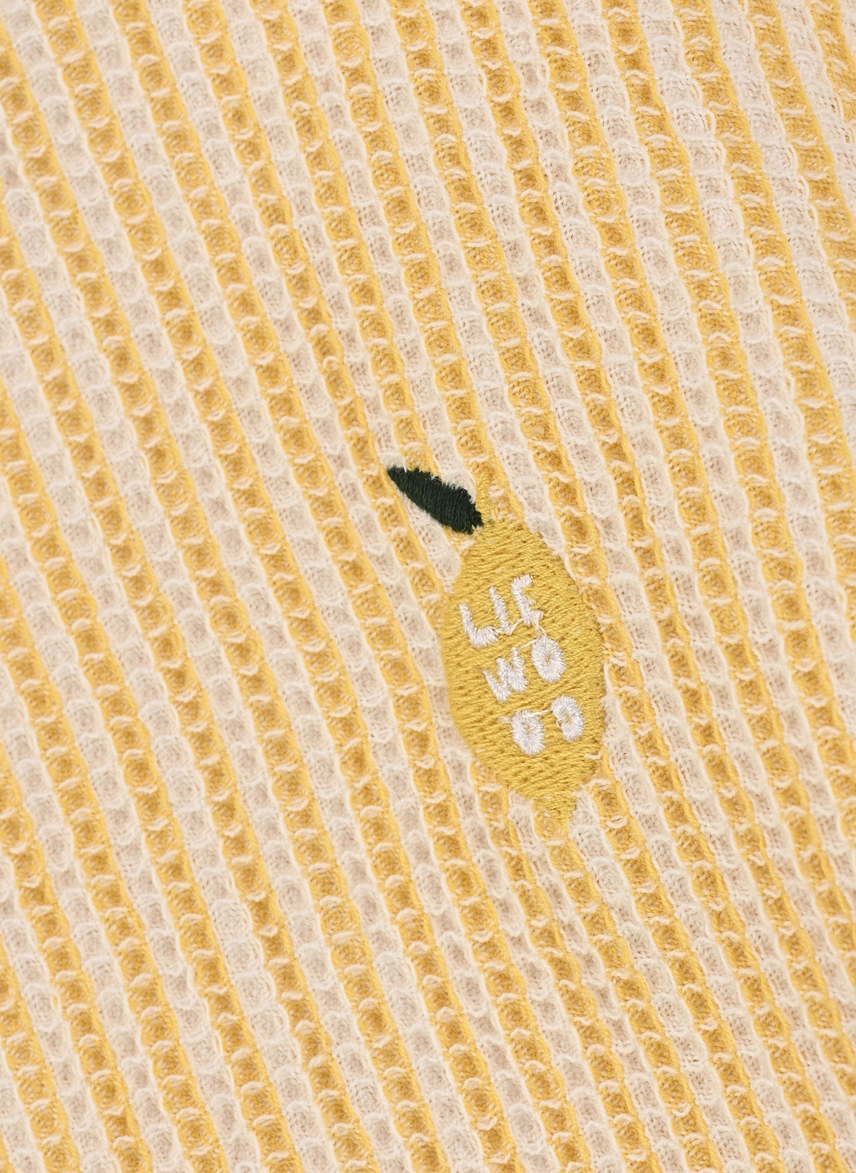 Badjassen en badcapes Paco Poncho Embroidery geel Liewood Badjassen en badcapes Paco Poncho Embroidery geel Lemon yellow / creme de la cre