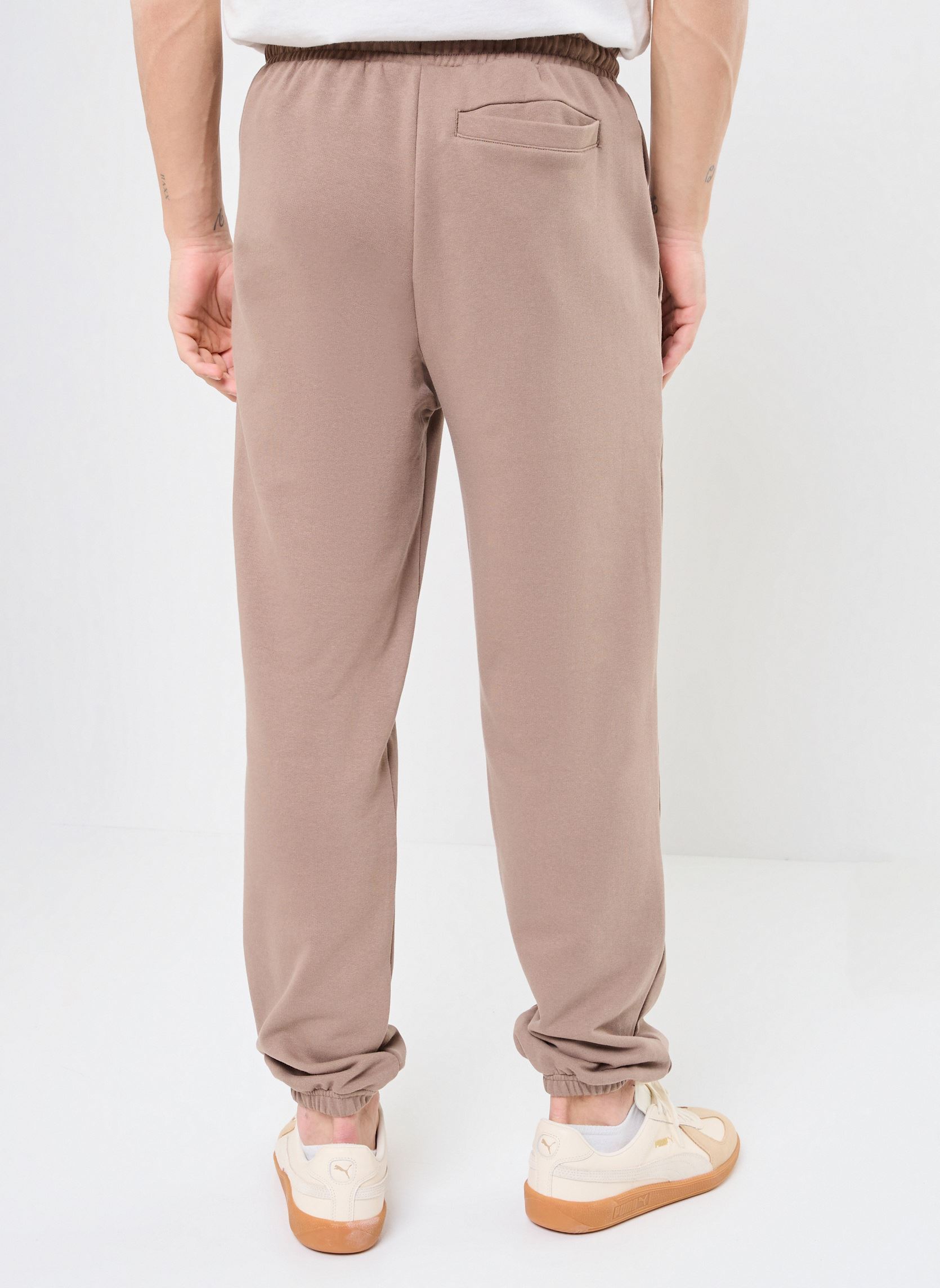Bas de jogging WARDROBE ESS Relaxed Sweatpants TR cl homme marron Puma Bas de jogging WARDROBE ESS Relaxed Sweatpants TR cl homme marron Totally Taupe