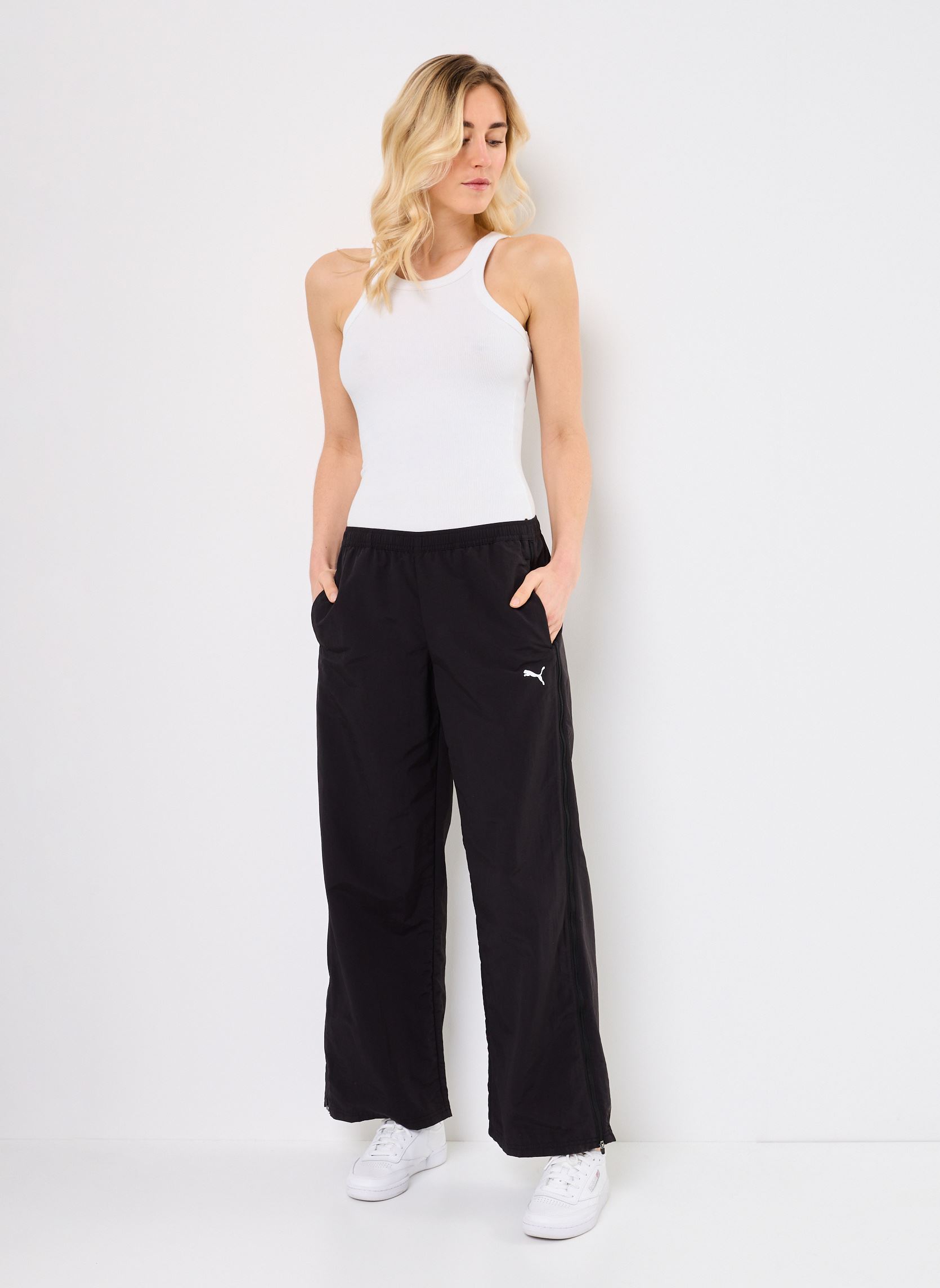 Pantaloni da jogging DARE TO Relaxed Woven Zip-Off Pants op donna nero Puma Pantaloni da jogging DARE TO Relaxed Woven Zip-Off Pants op donna nero Puma Black