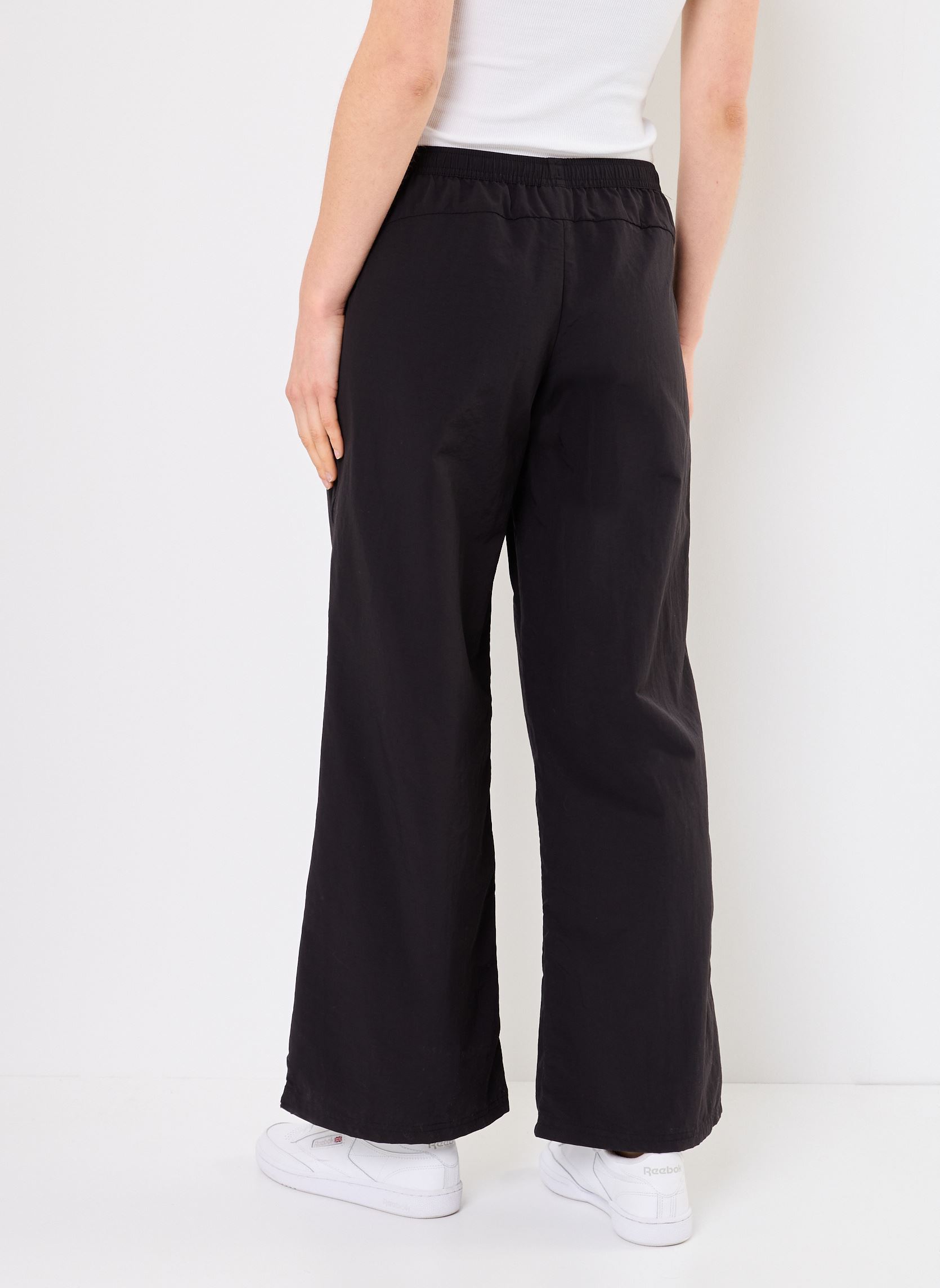 Pantaloni da jogging DARE TO Relaxed Woven Zip-Off Pants op donna nero Puma Pantaloni da jogging DARE TO Relaxed Woven Zip-Off Pants op donna nero Puma Black