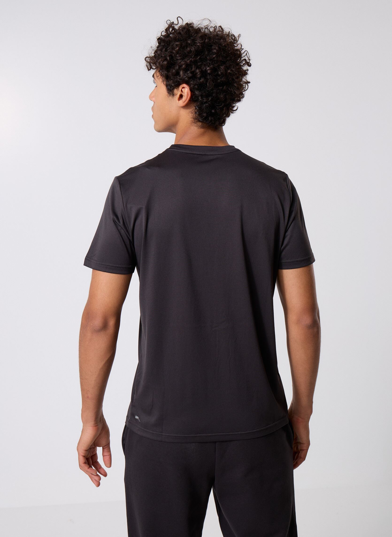 Tee-shirts manches courtes M TAD ESSENTIALS SOLID CAT TEE (LC small homme noir Puma Tee-shirts manches courtes M TAD ESSENTIALS SOLID CAT TEE (LC small homme noir Puma Black