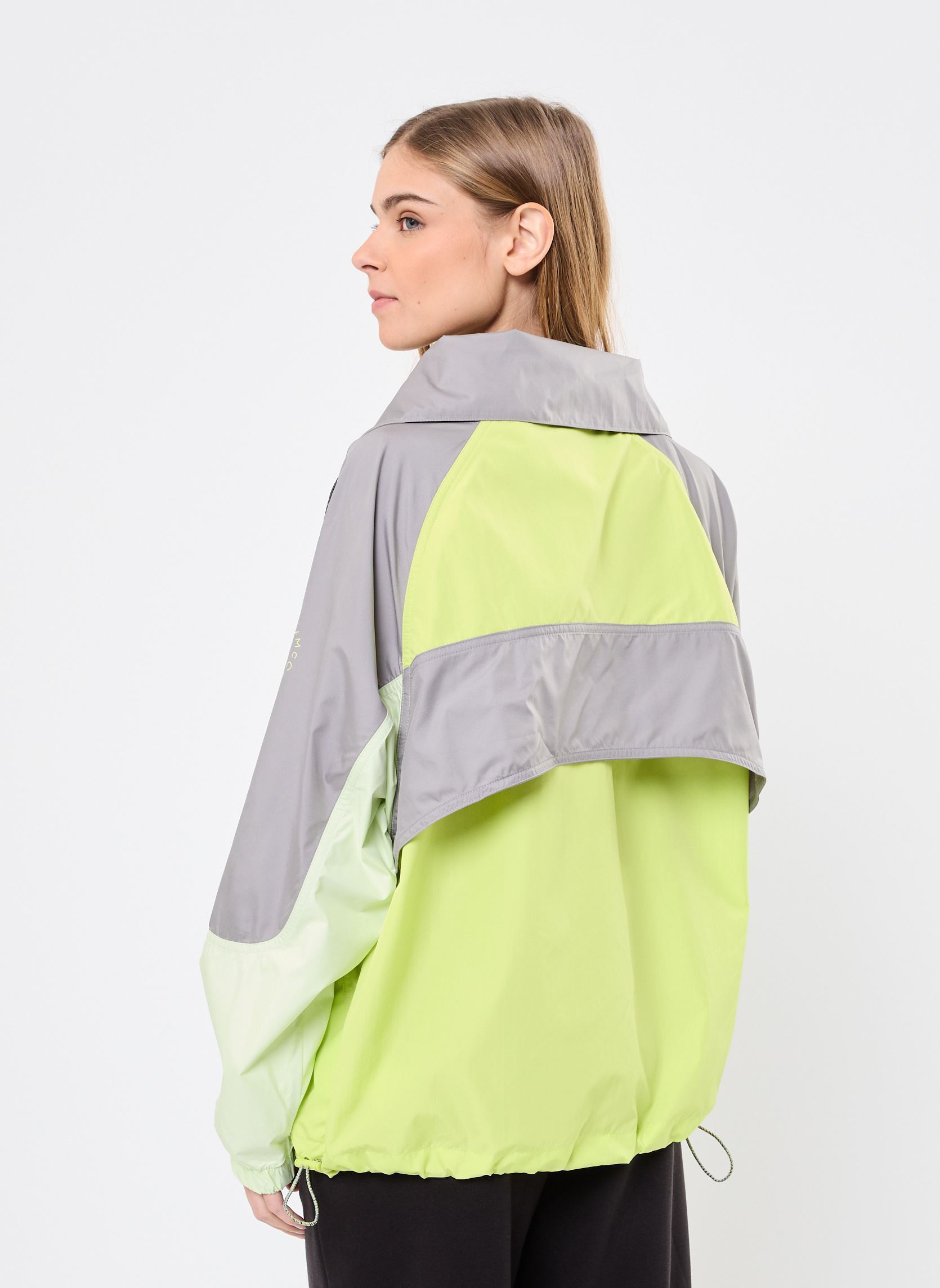 Vestes imperméable Asmc Tn Po Jkt femme vert adidas by Stella McCartney Vestes imperméable Asmc Tn Po Jkt femme vert BRIBAH/GRICOL/HALO