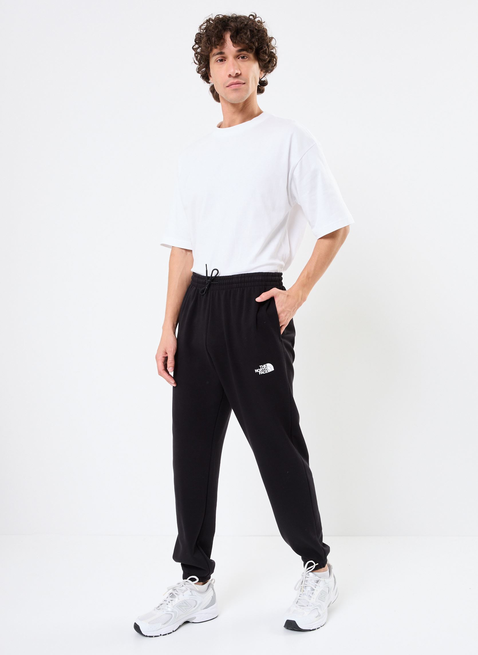 Tute M SIMPLE DOME LIGHT REGULAR TAPERED JOGG uomo nero The North Face Tute M SIMPLE DOME LIGHT REGULAR TAPERED JOGG uomo nero TNF BLACK