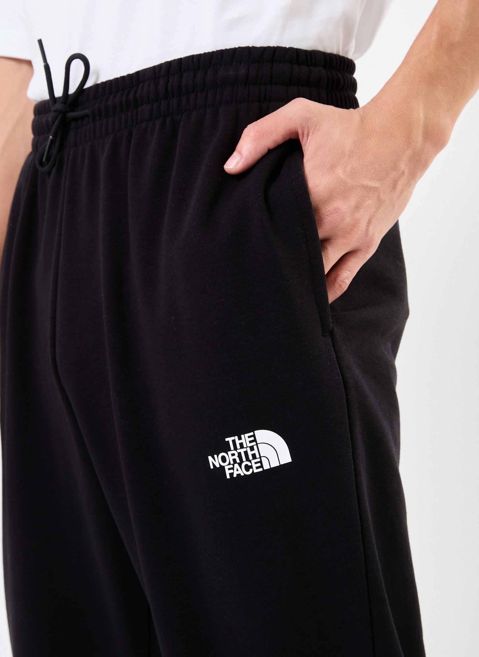 Tute M SIMPLE DOME LIGHT REGULAR TAPERED JOGG uomo nero The North Face Tute M SIMPLE DOME LIGHT REGULAR TAPERED JOGG uomo nero TNF BLACK