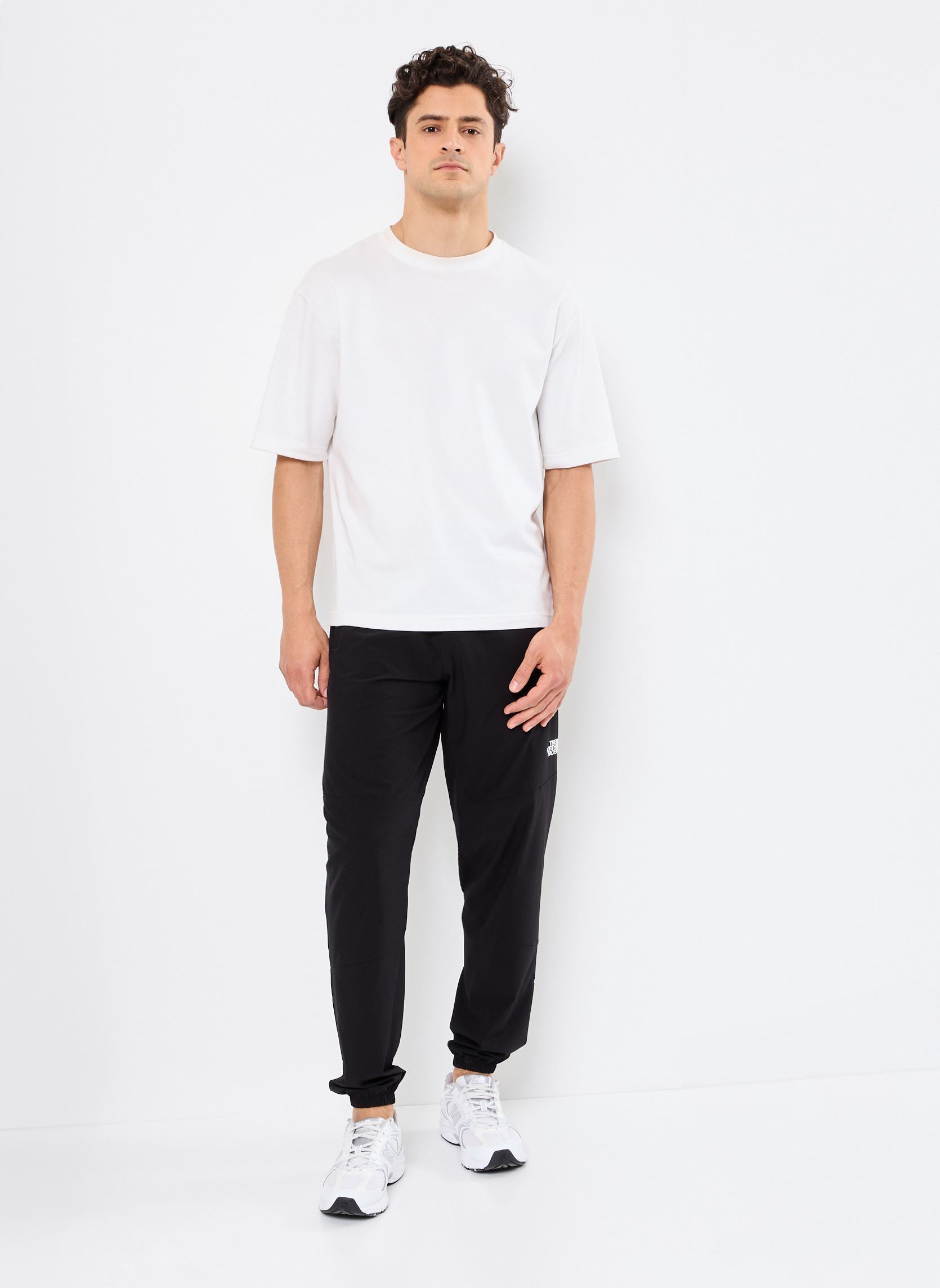 Pantalons droits M MA WIND PANT homme noir The North Face Pantalons droits M MA WIND PANT homme noir TNF BLACK