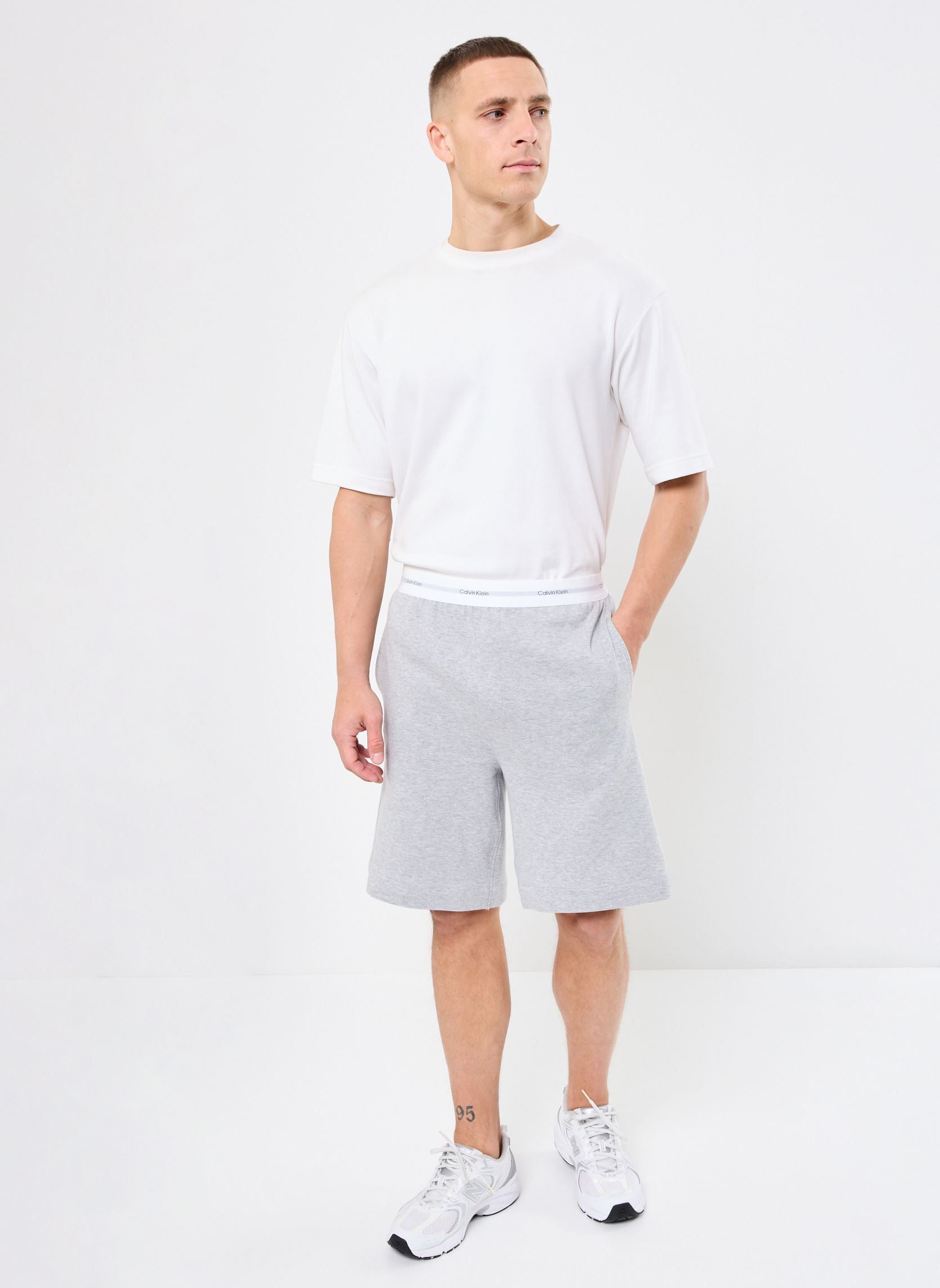 Shorts de sport Sleep Short 000NM2707E homme gris Calvin Klein Shorts de sport Sleep Short 000NM2707E homme gris MEDIUM GREY HEATHER