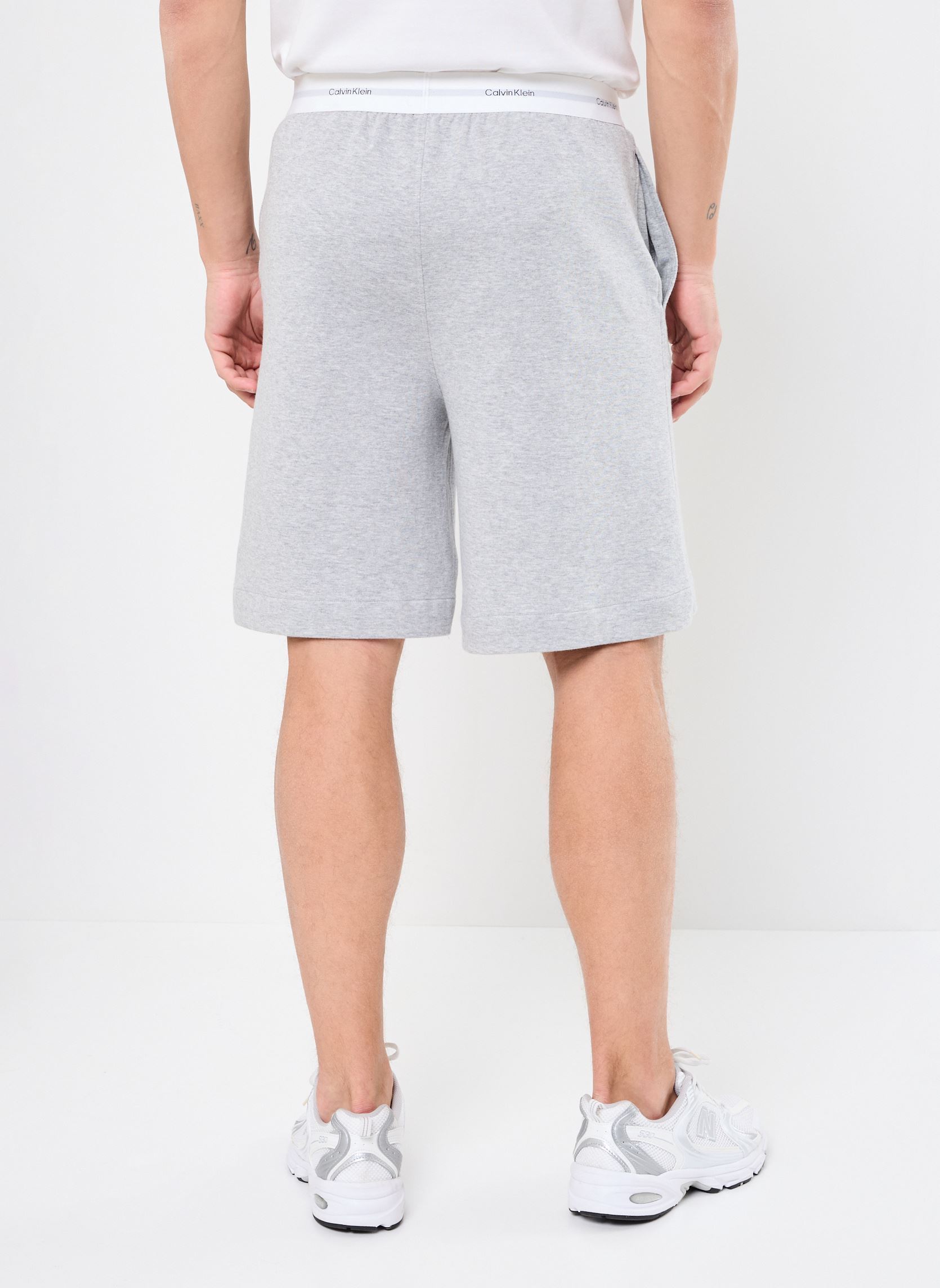 Shorts de sport Sleep Short 000NM2707E homme gris Calvin Klein Shorts de sport Sleep Short 000NM2707E homme gris MEDIUM GREY HEATHER