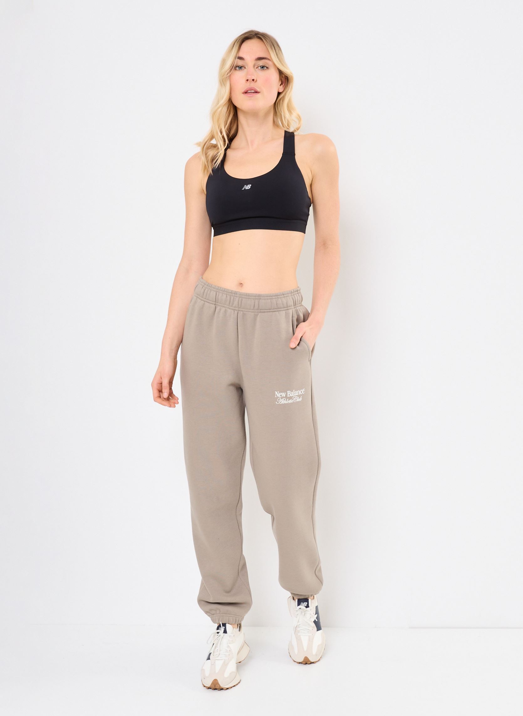 Pantaloni da jogging Linear Fleece Jogger donna beige New Balance Pantaloni da jogging Linear Fleece Jogger donna beige DOCKSIDE