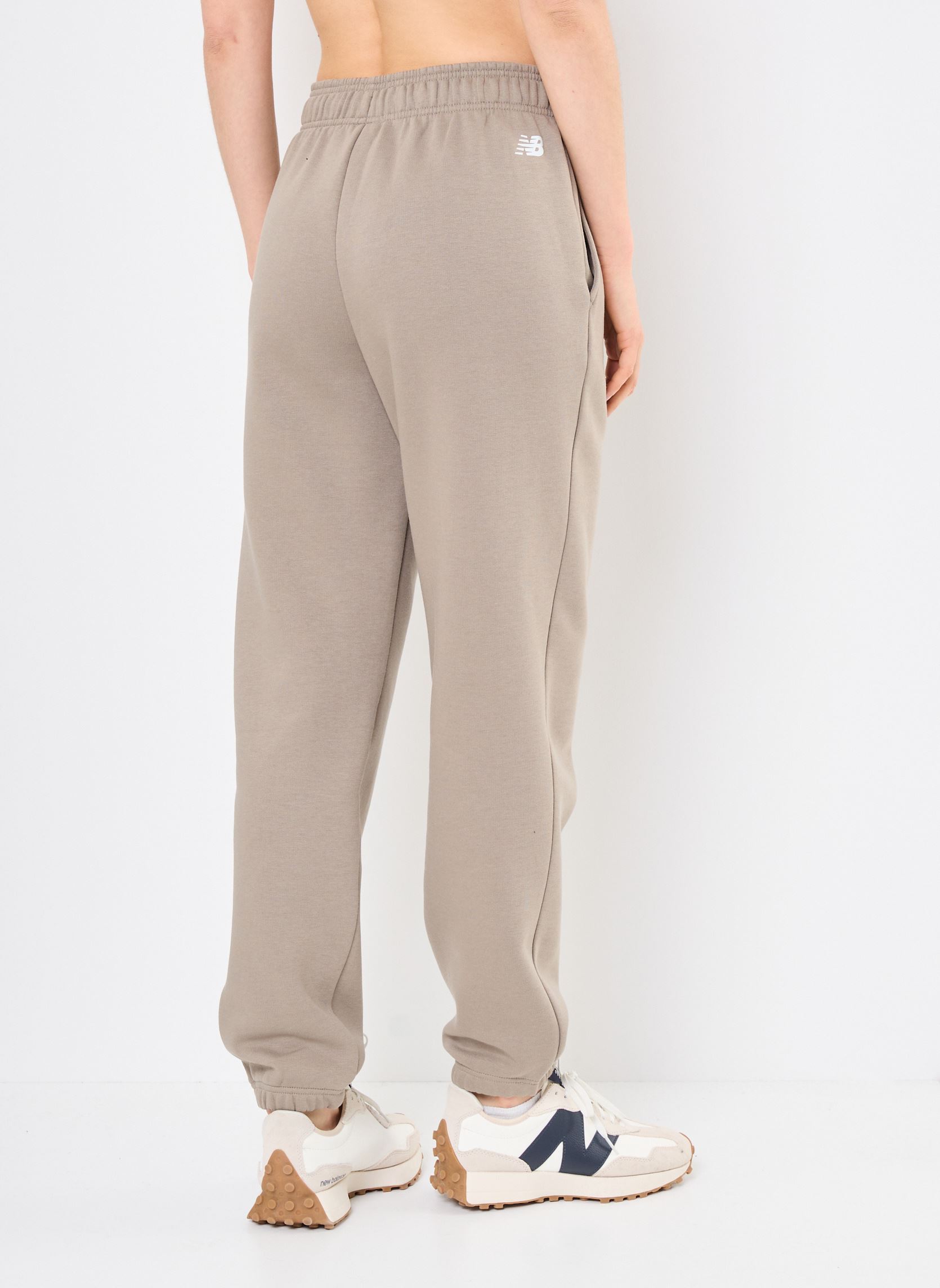 Pantaloni da jogging Linear Fleece Jogger donna beige New Balance Pantaloni da jogging Linear Fleece Jogger donna beige DOCKSIDE