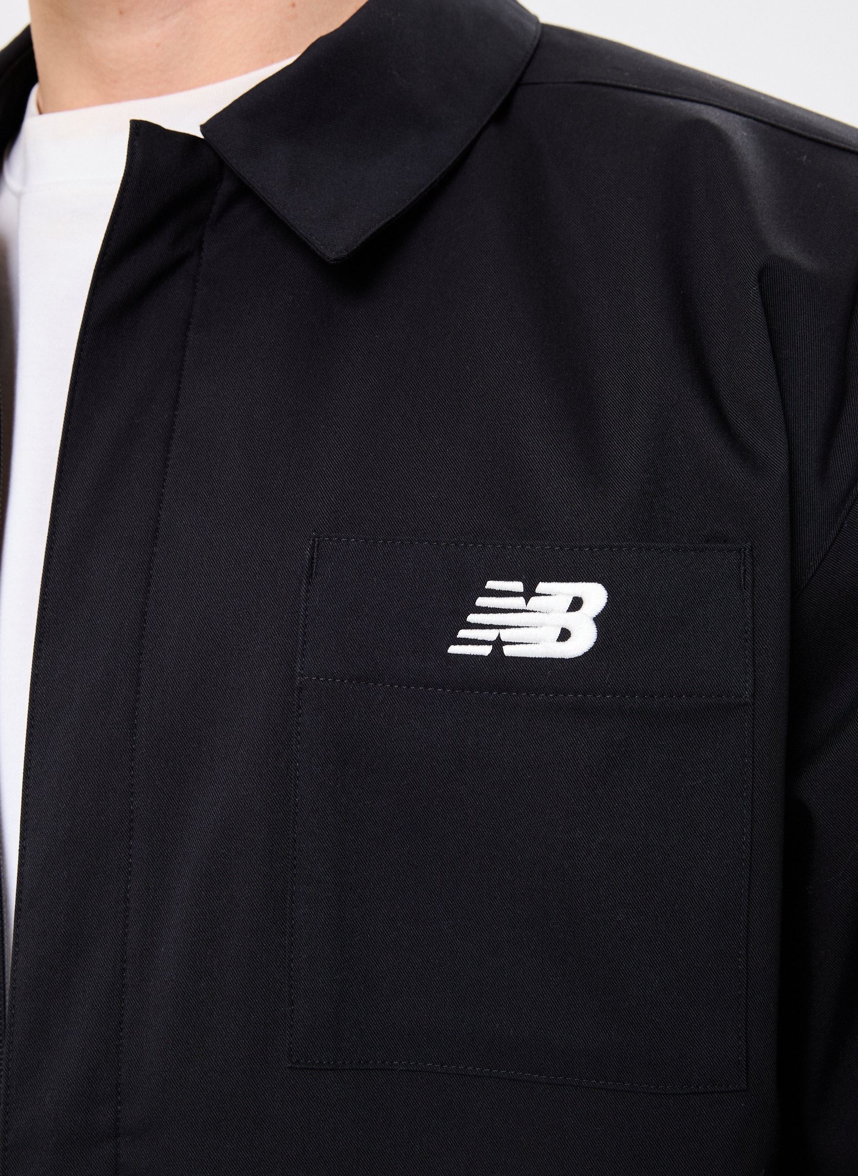 Blousons Coaches Twill Jacket homme noir New Balance Blousons Coaches Twill Jacket homme noir BLACK